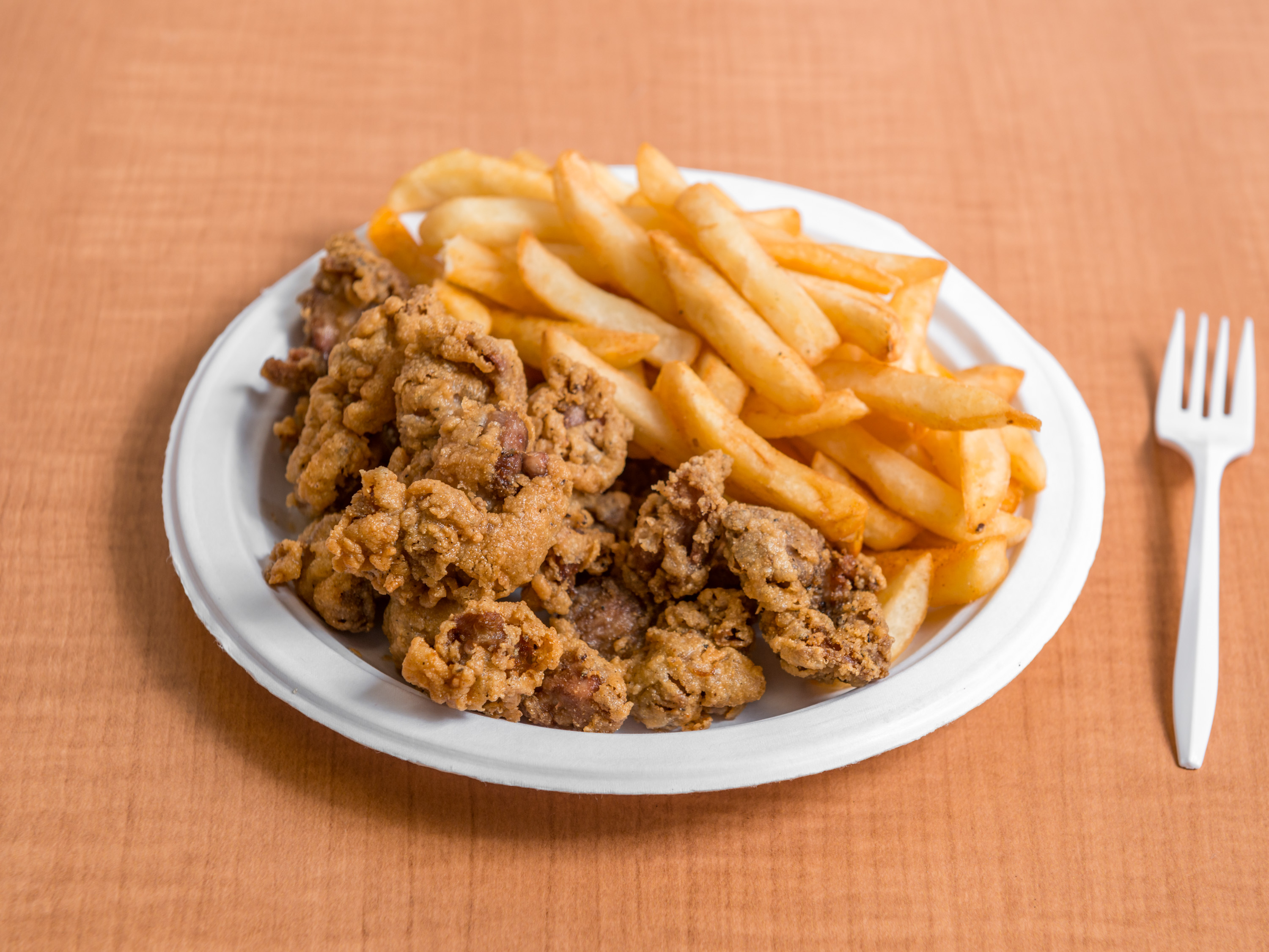 Order 1/2 lb. Chicken Gizzards food online from Nick's Gyros Seafood IV store, Columbia on bringmethat.com