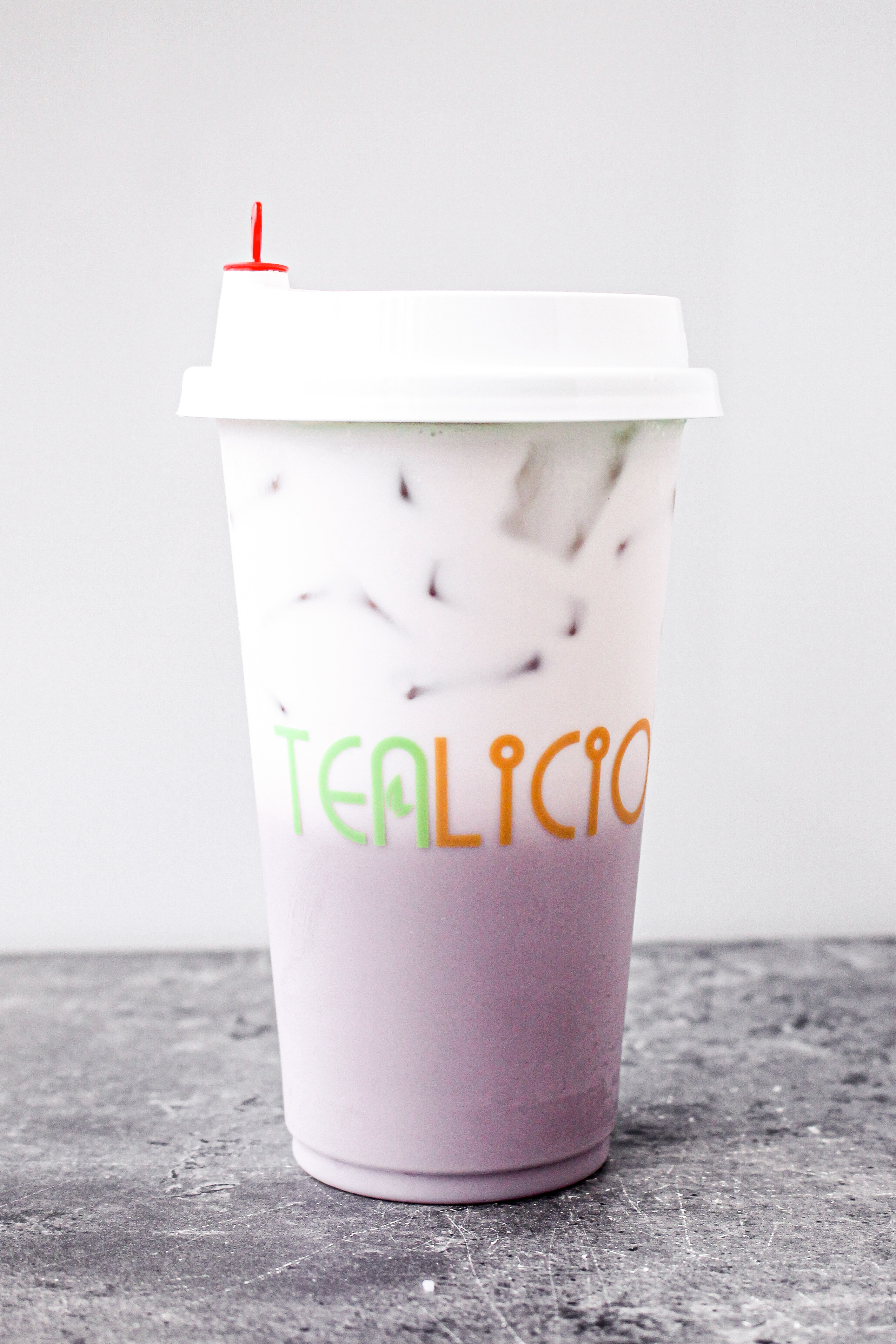Order Taro Milk Tea food online from Tealicious store, Knoxville on bringmethat.com