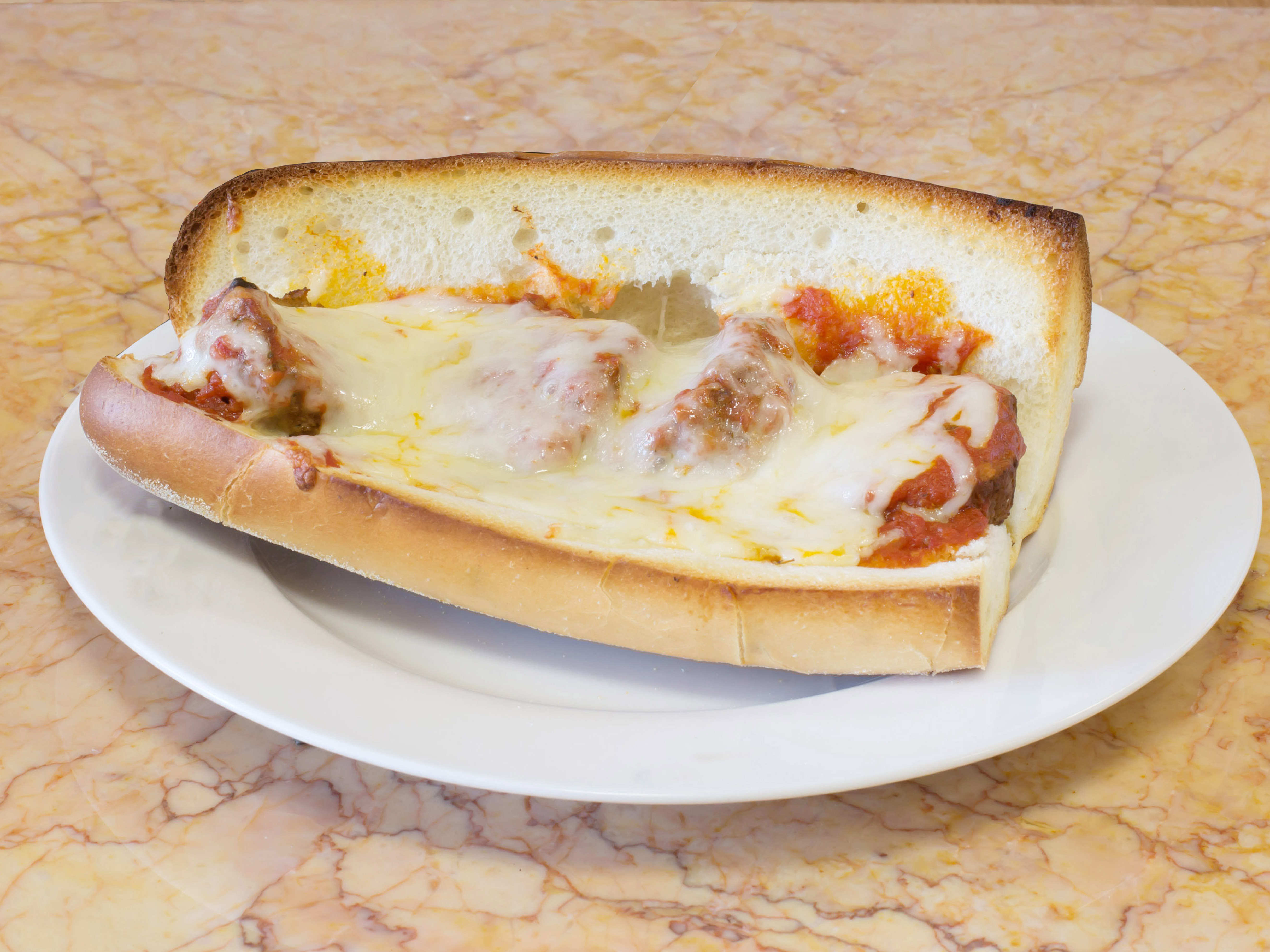 Order Meatball Parmigiana Hero food online from Outta Hand Pizza store, Westfield on bringmethat.com