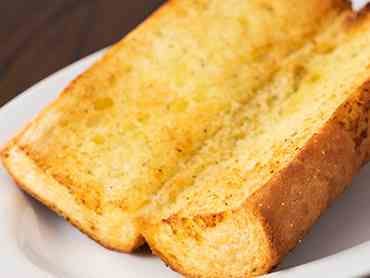 Order Garlic Bread with Garlic Butter & Herb - Appetizer food online from Rosati Pizza store, North Pekin on bringmethat.com