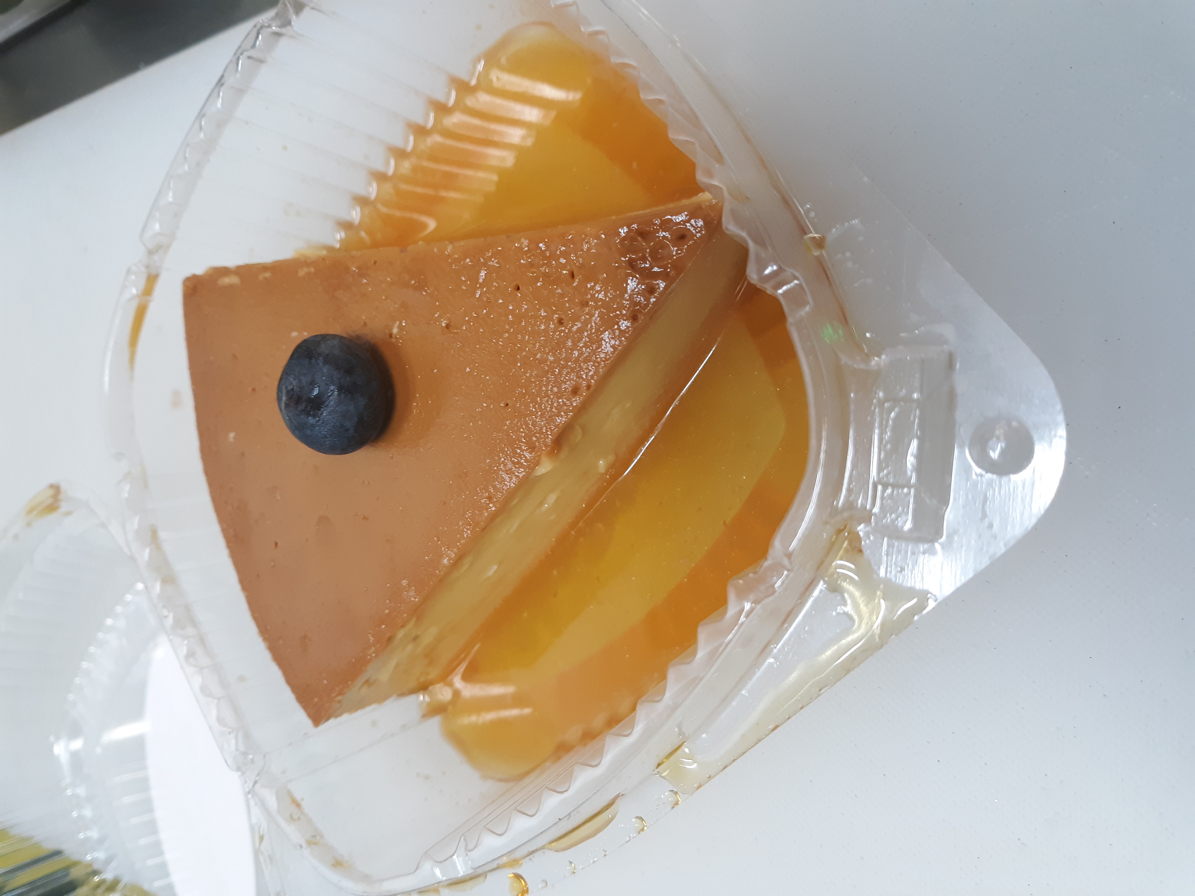 Order Flan D Leche food online from Oscar's Kitchen store, Bronx on bringmethat.com