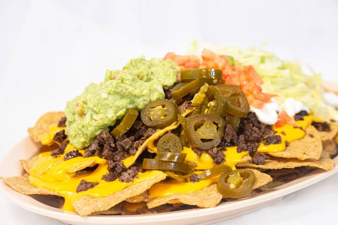 Order Loaded Nachos food online from Taqueria Express store, Chicago on bringmethat.com