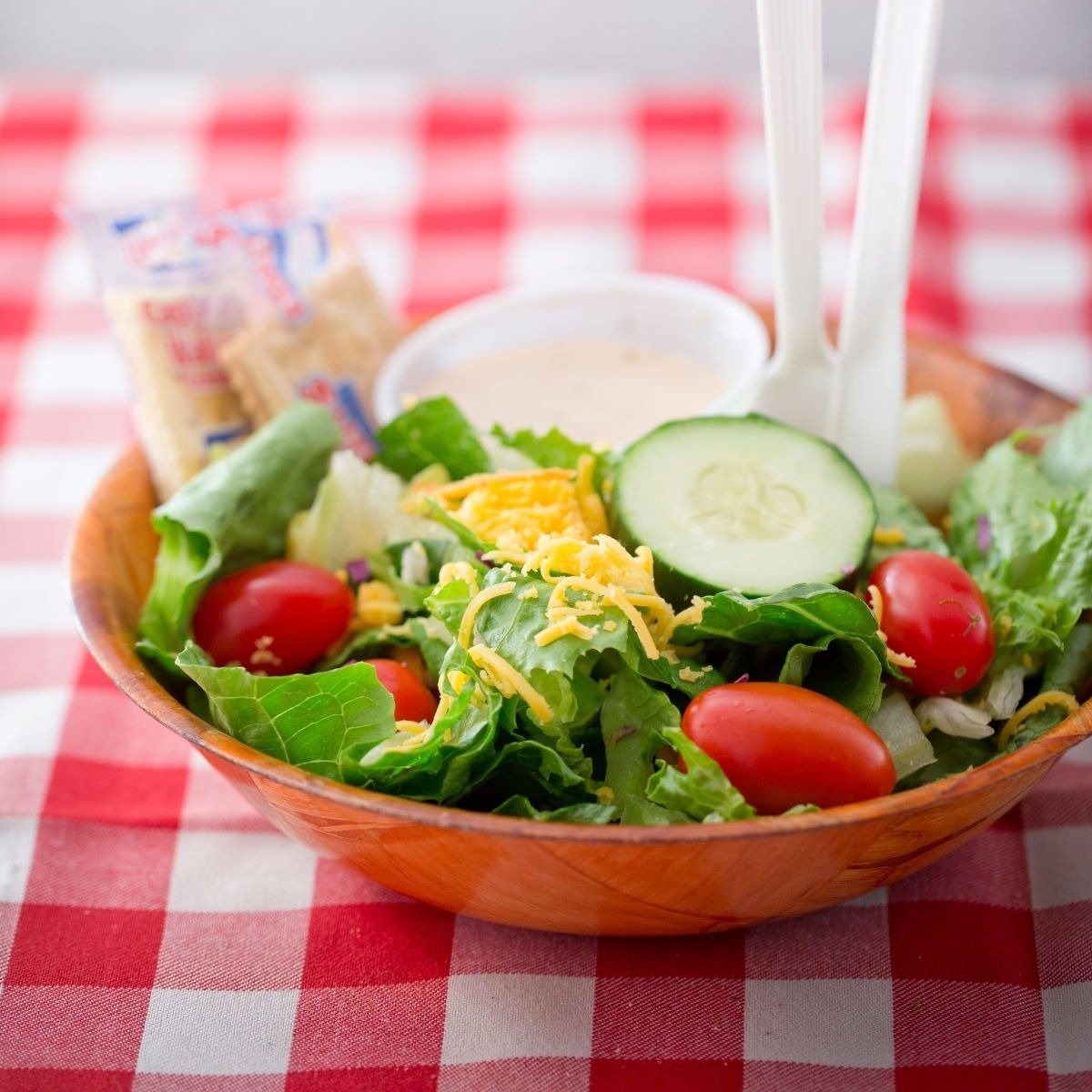 Order Tossed Salad food online from Huey's Cordova store, Cordova on bringmethat.com