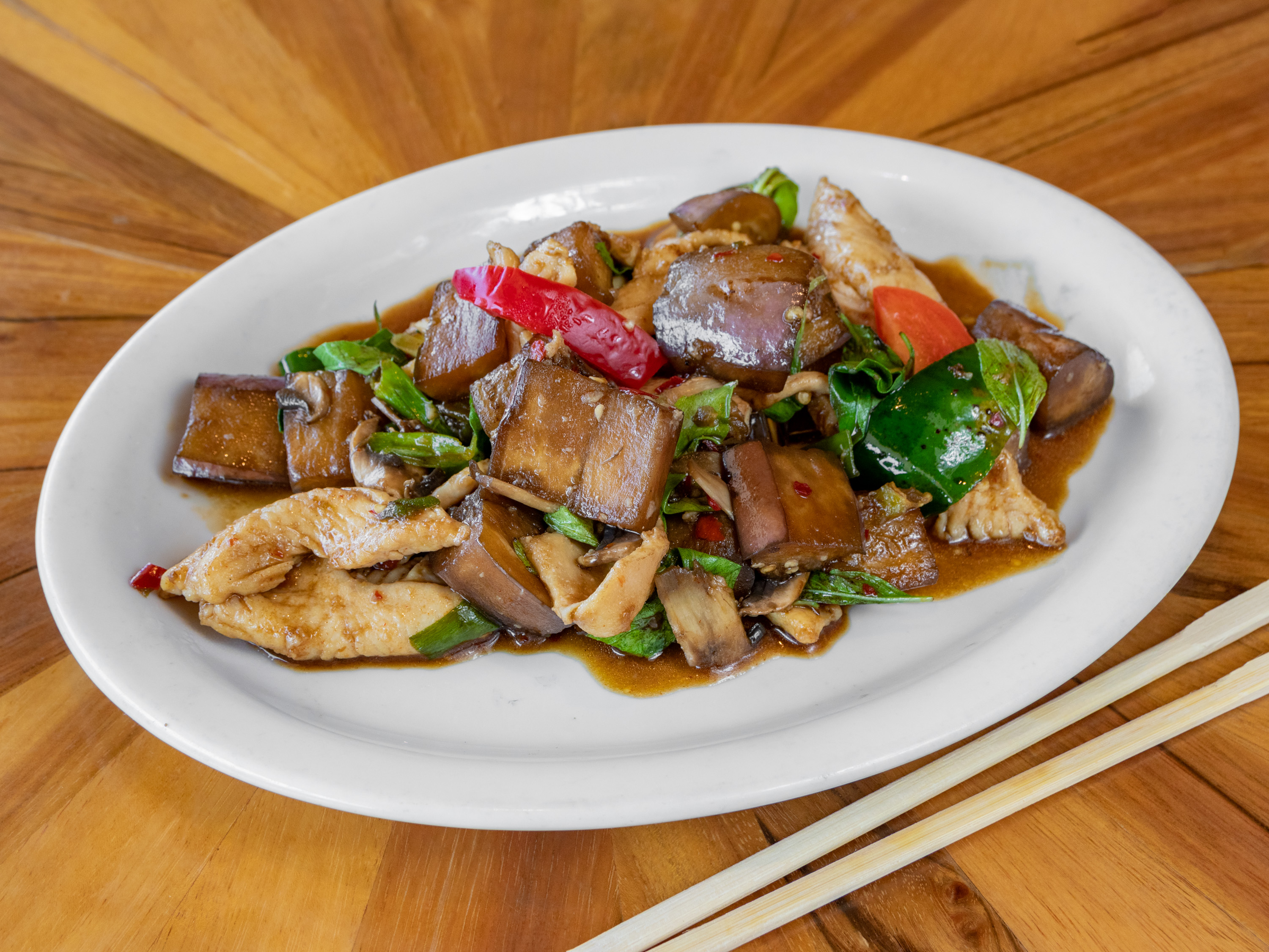 Order 28. Eggplants in Spicy Sauce food online from Peppers Thai store, Palm Springs on bringmethat.com