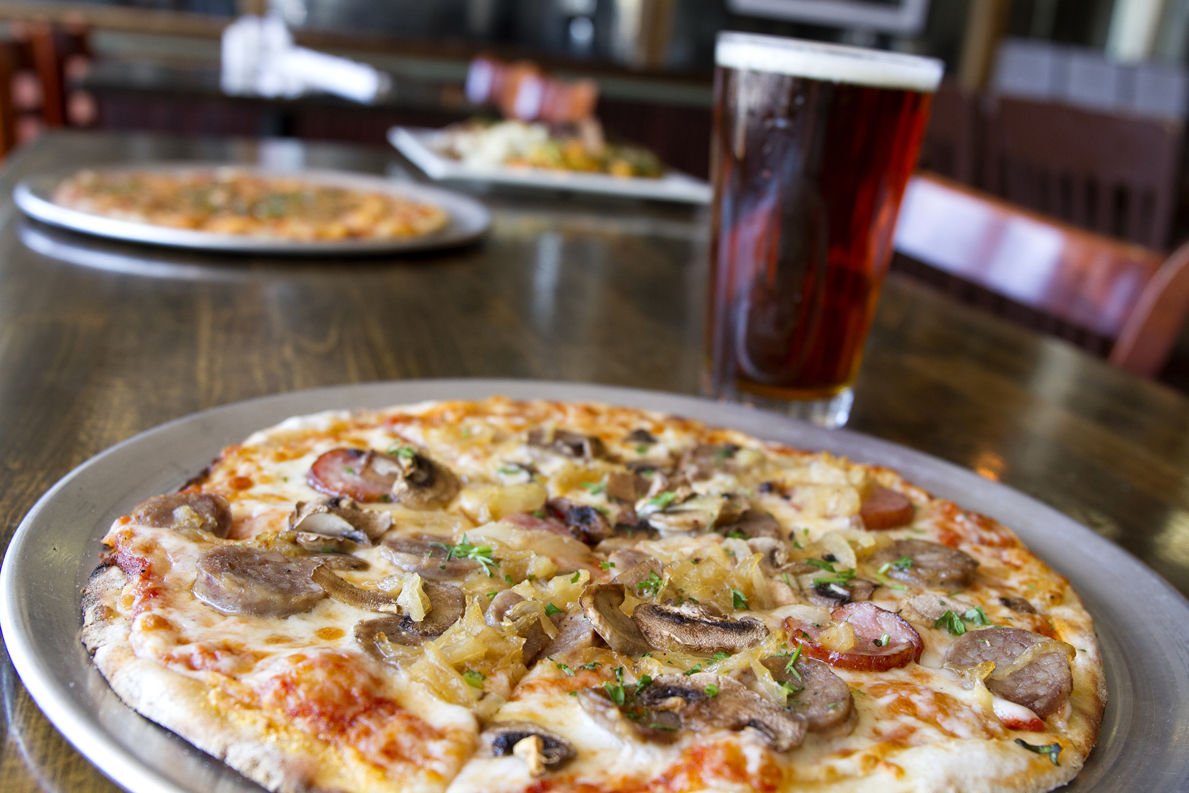Order 10" Three Sausage Pizza food online from Beaver Street Brewery store, Flagstaff on bringmethat.com