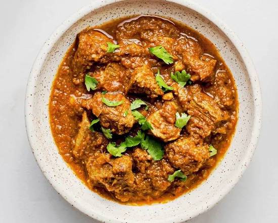Order Mutton Curry food online from Bombay Bistro store, Austin on bringmethat.com