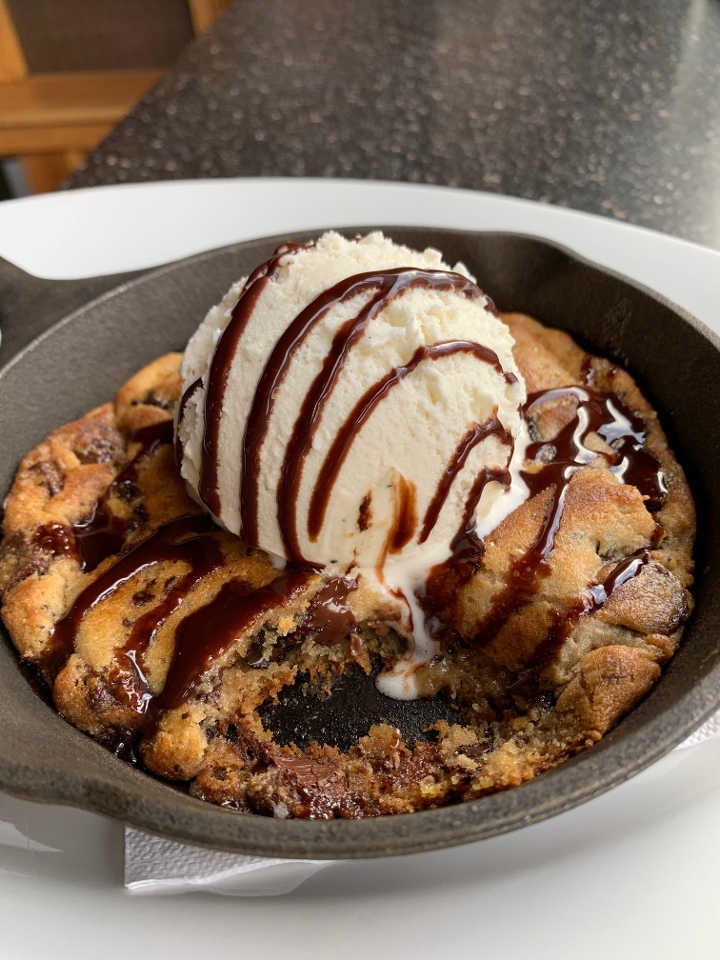 Order *Still's Amazing Chocolate Chunk Skillet Cookie food online from The Distillery Restaurant store, Victor on bringmethat.com