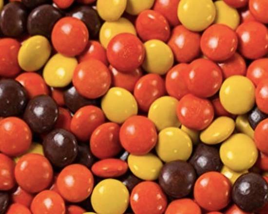 Order Reese's Pieces (pint) food online from Ben & Jerry's store, Highland Village on bringmethat.com
