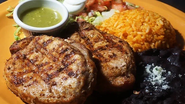Order Grilled Pork Chops food online from Noches Mexicanas store, Bronx on bringmethat.com