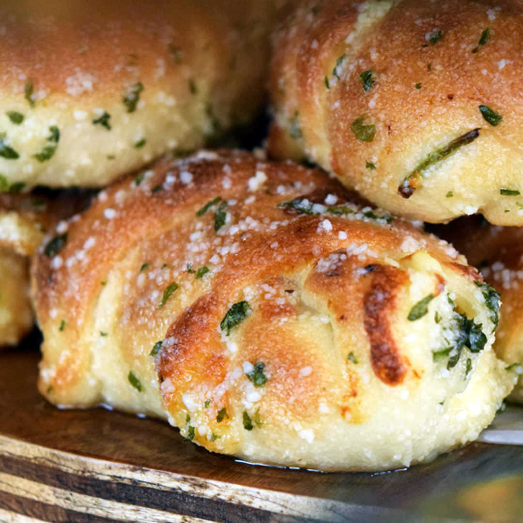 Order Garlic Knots (order of 6) food online from Mr. Moto's Pizza store, San Diego on bringmethat.com