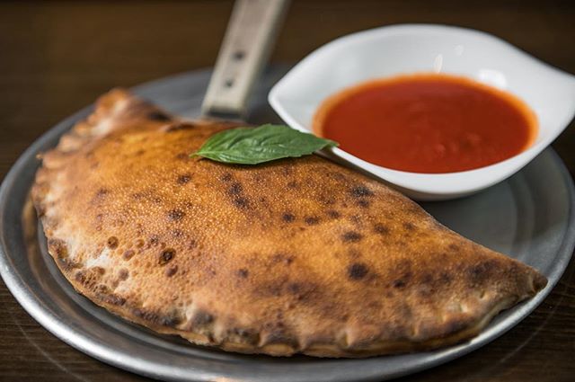 Order 4 Cheese Calzone food online from Table 87 coal oven pizza * by the slice * store, Brooklyn on bringmethat.com