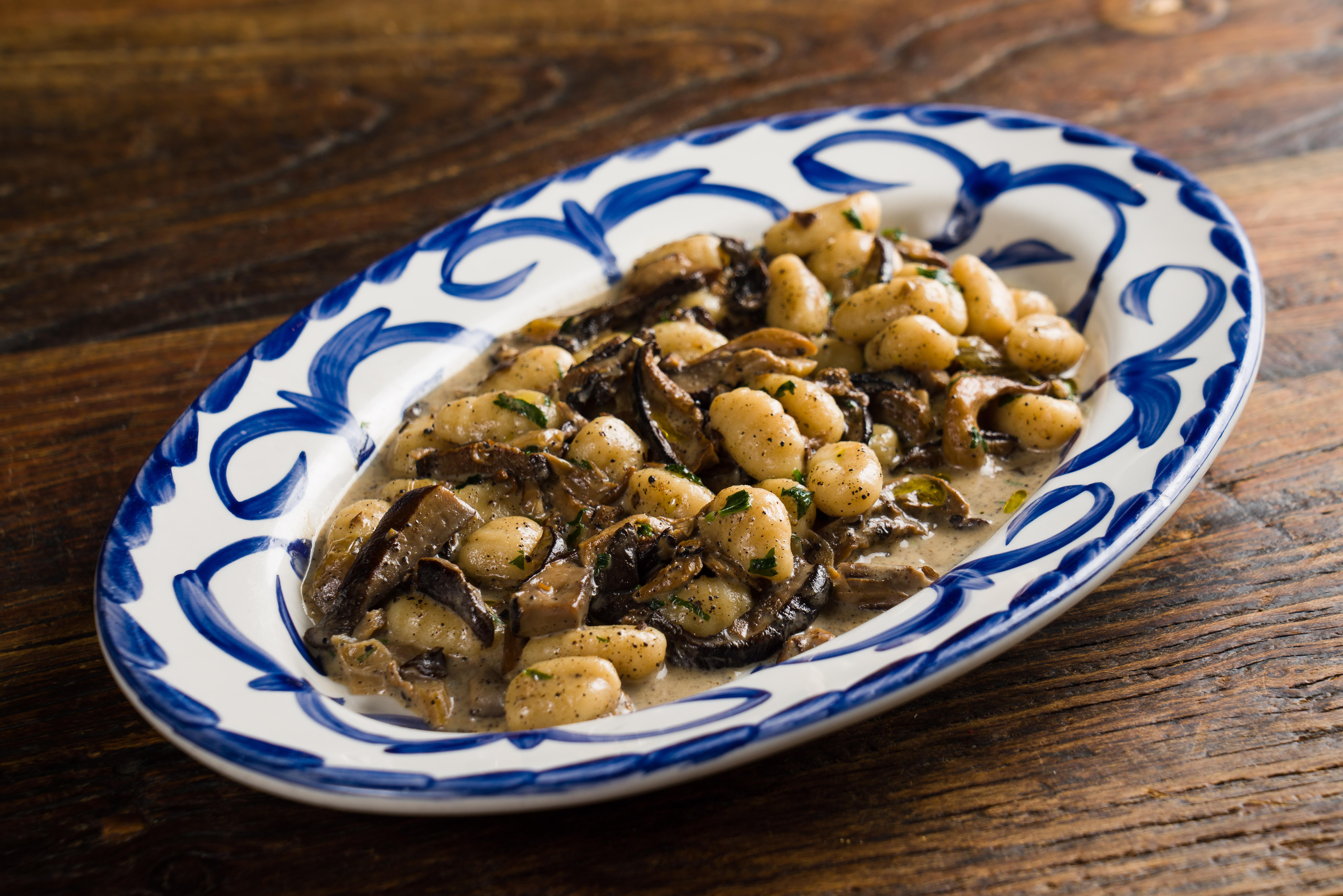 Order Gnocchi ai Funghi food online from Felice 64 store, New York on bringmethat.com