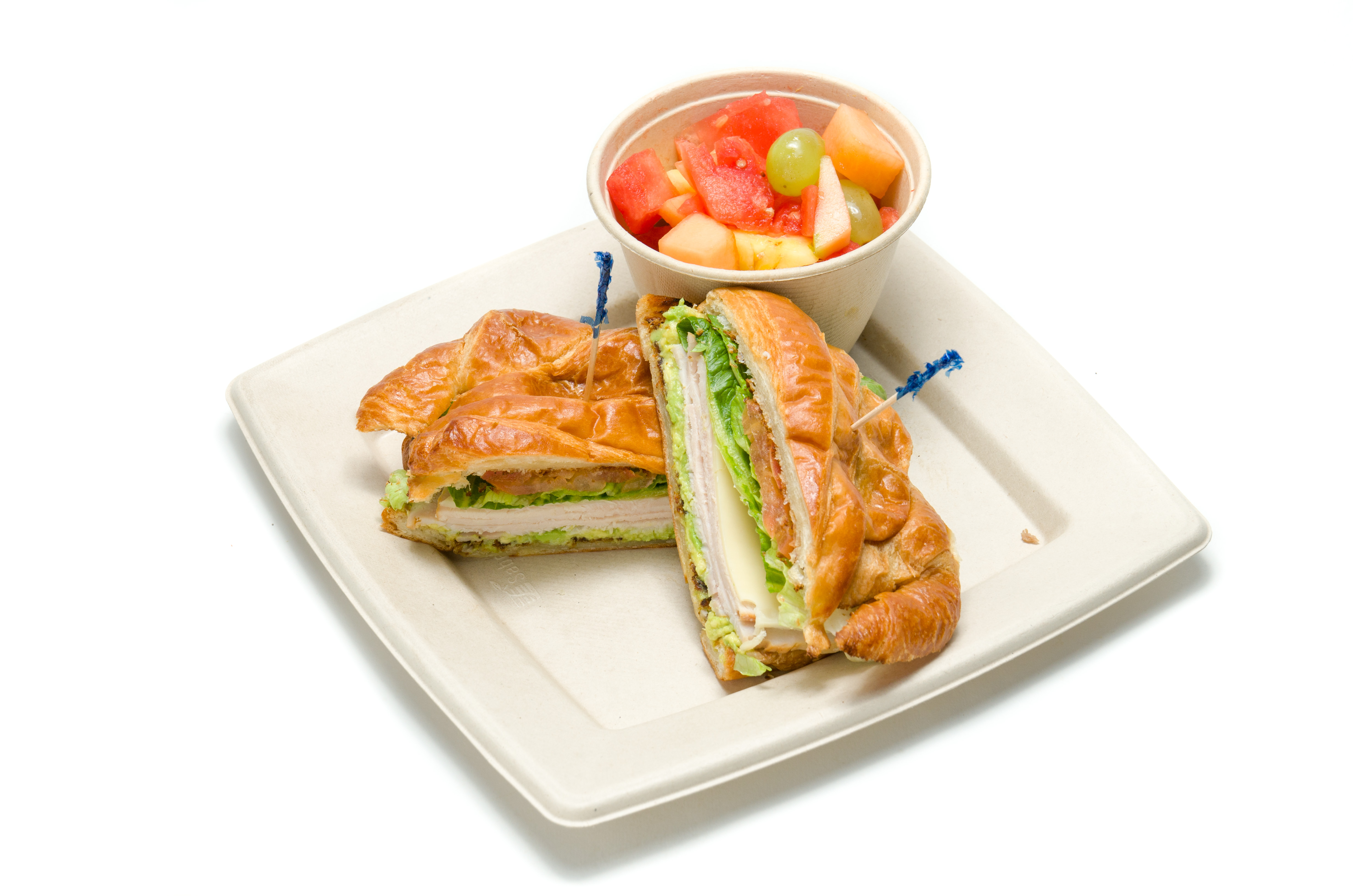 Order Turkey Avocado Croissant Sandwich food online from Merengue Bakery & Cafe store, Monrovia on bringmethat.com