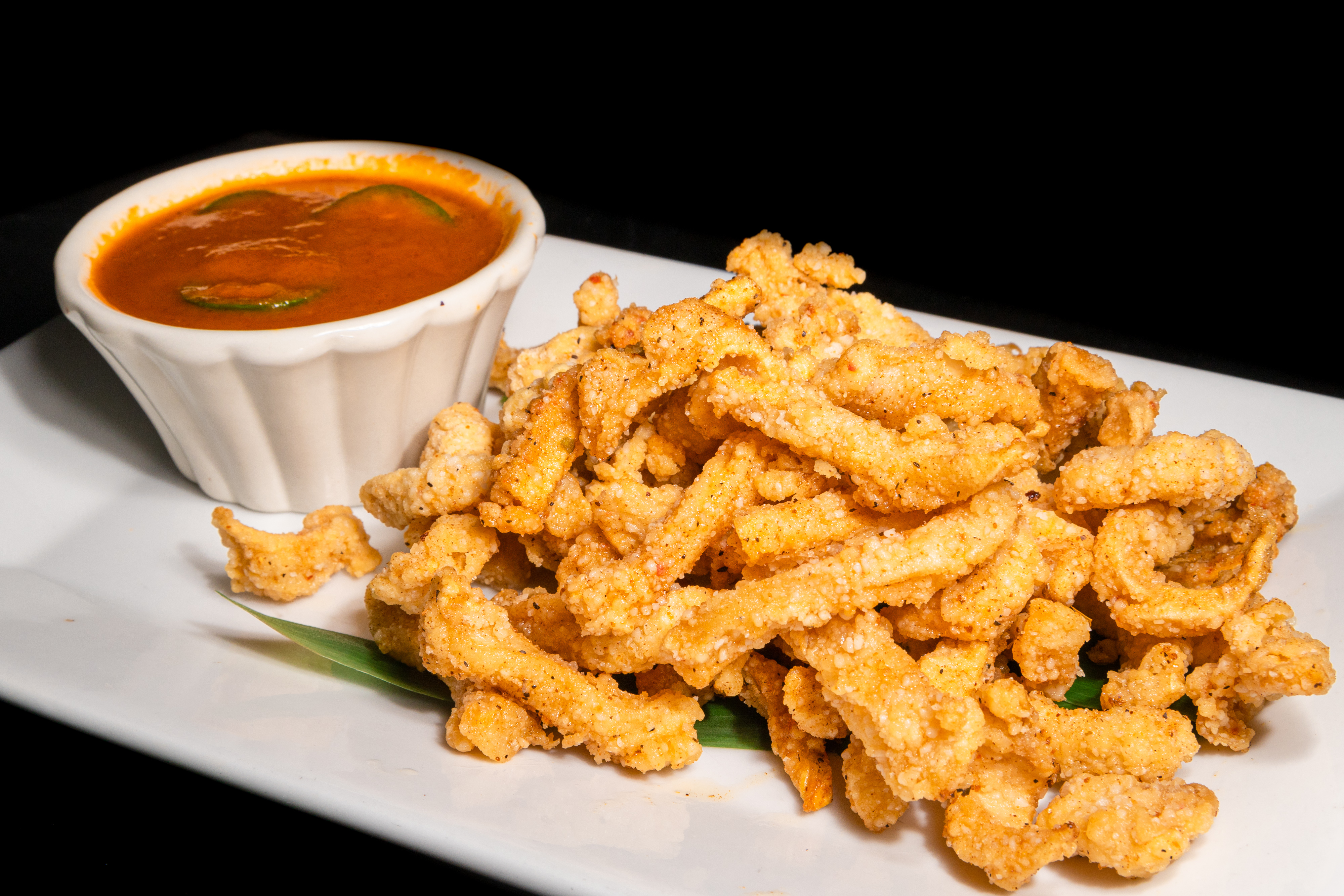 Order Calamari food online from Cafe Ginger store, Houston on bringmethat.com