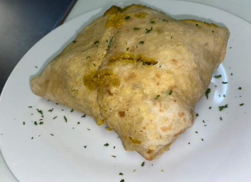 Order Curried Chicken Roti food online from Cafe Mobay store, Bloomfield on bringmethat.com