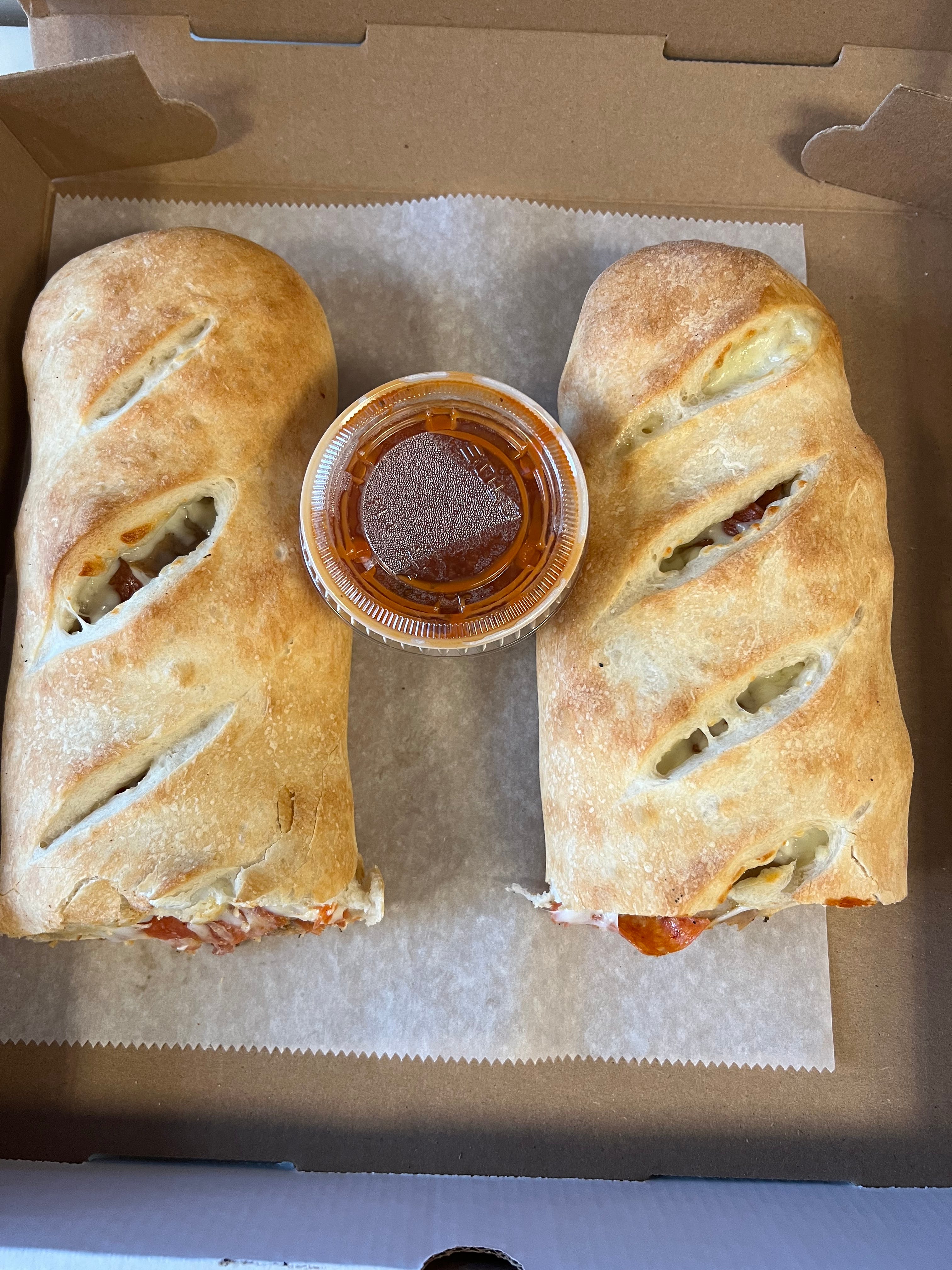 Order Phily cheese Stromboli - Philly steak and cheese food online from Four Brothers Pizza store, Westport on bringmethat.com