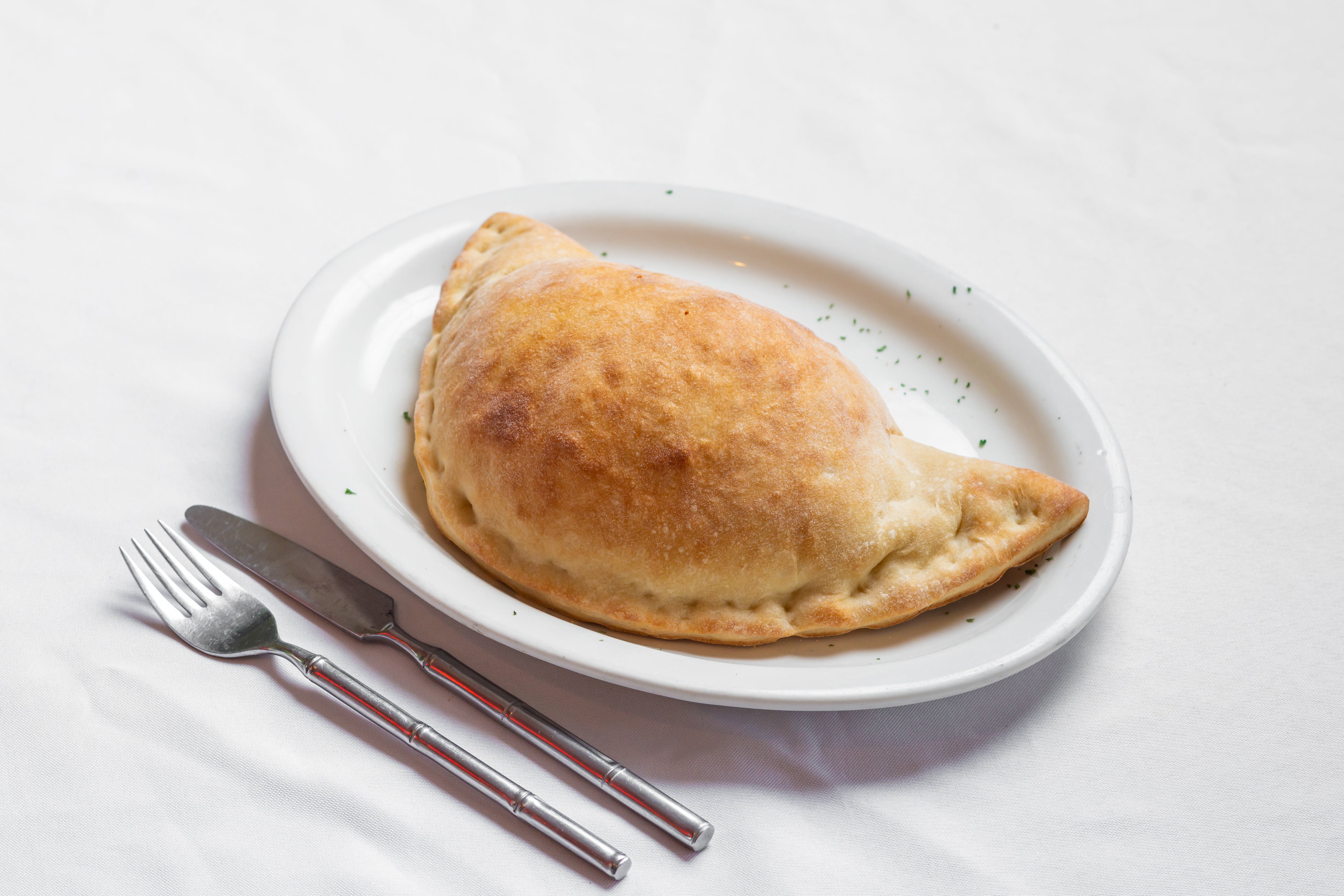 Order Calzone - Regular food online from Uncle Sal Pizza Ii store, Sparta Township on bringmethat.com