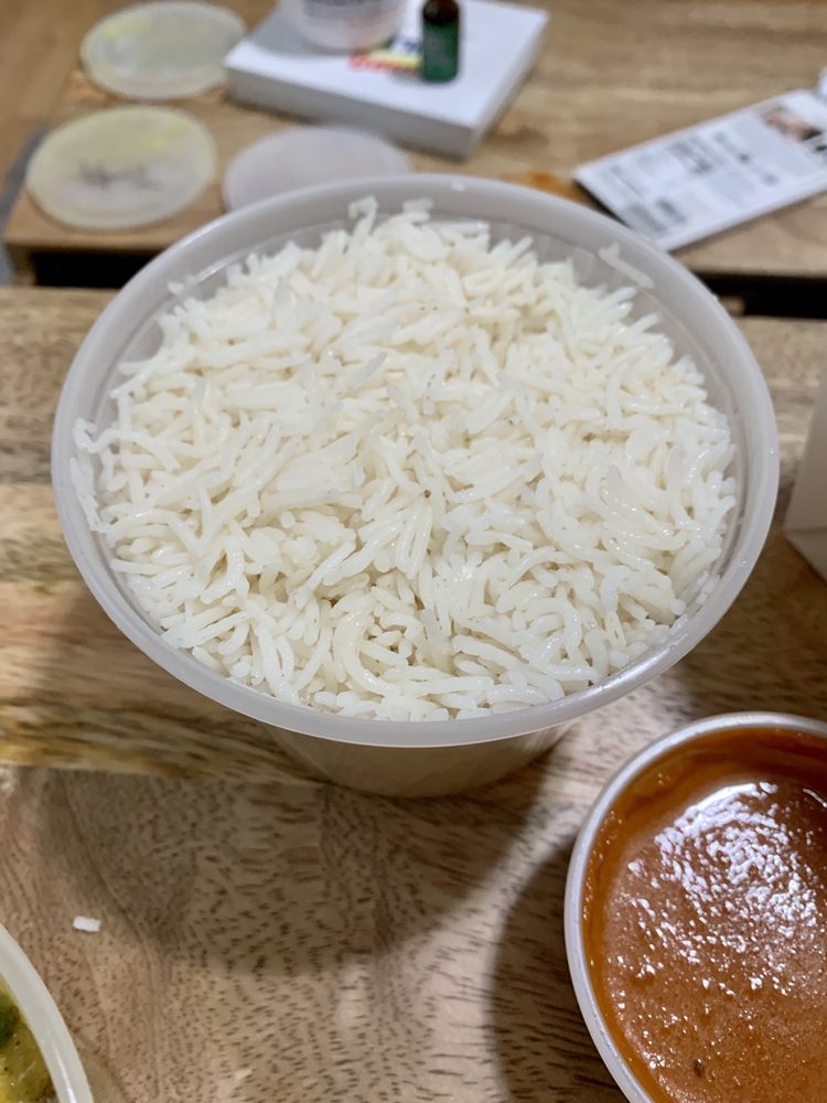 Order 16 oz. White Basmati Rice food online from Tashidelek Cuisine store, El Cerrito on bringmethat.com