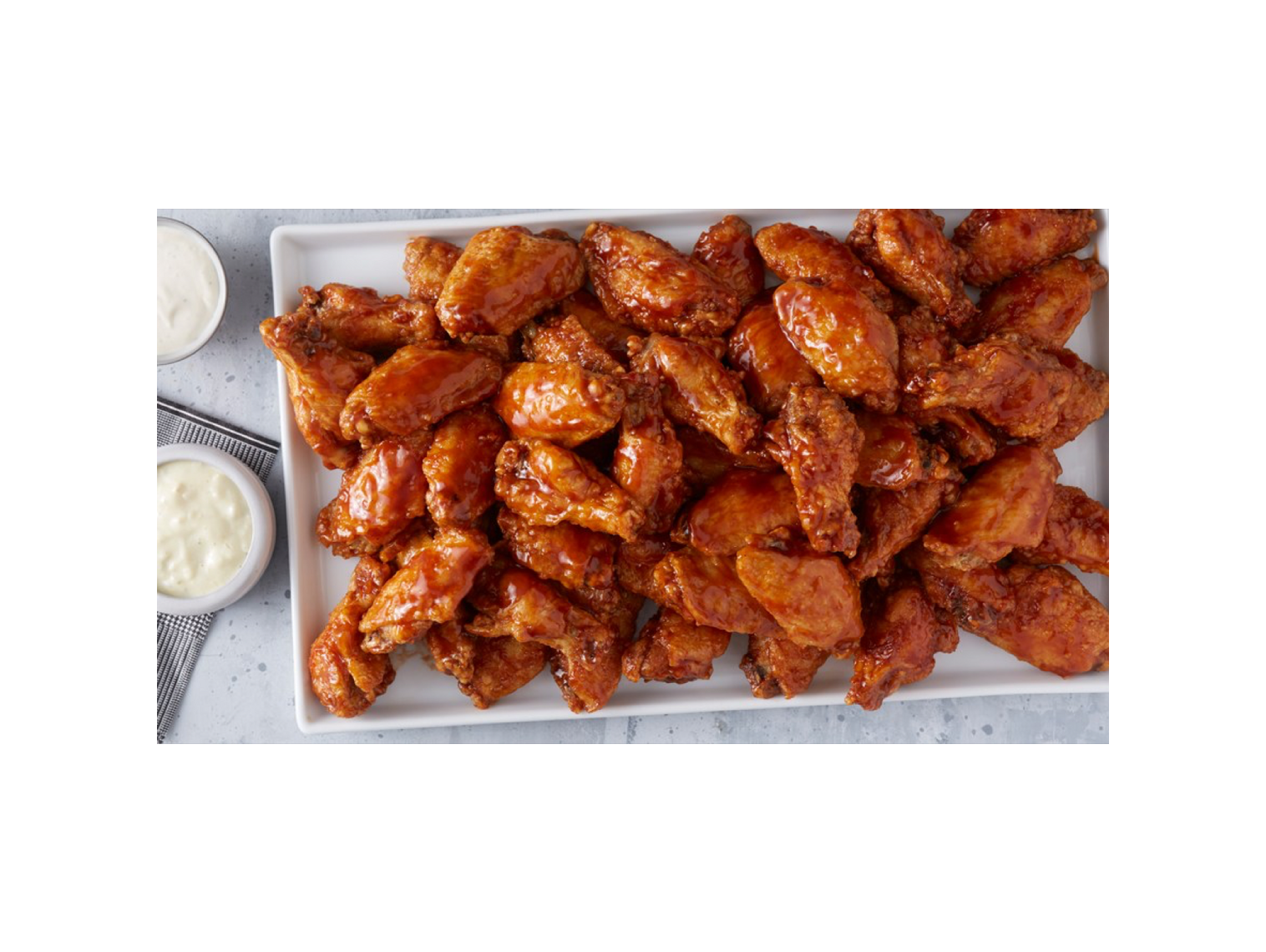 Order 50 Wings food online from Wings Over store, Greenville on bringmethat.com