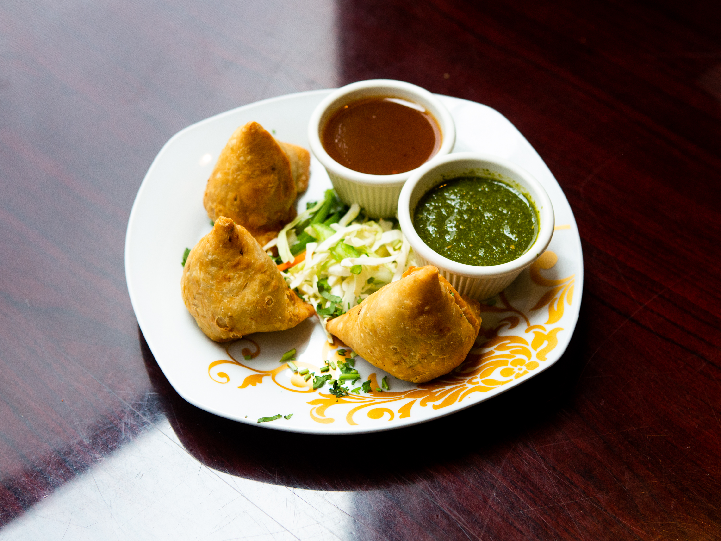 Order Vegetable Samosa food online from Bombay Indian Grill store, Morgantown on bringmethat.com