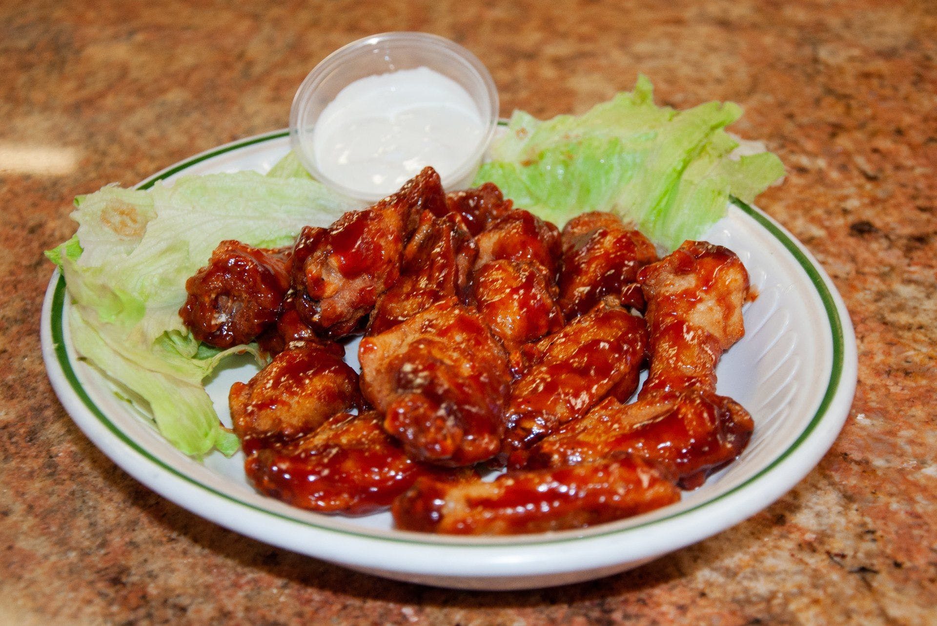 Order Bone-In Wings - 12 Pieces food online from Rocky Pizza store, Reading on bringmethat.com