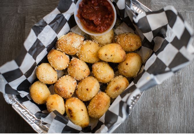 Order Garlic Parmesan Bites food online from Champ Pizza store, Clark County on bringmethat.com