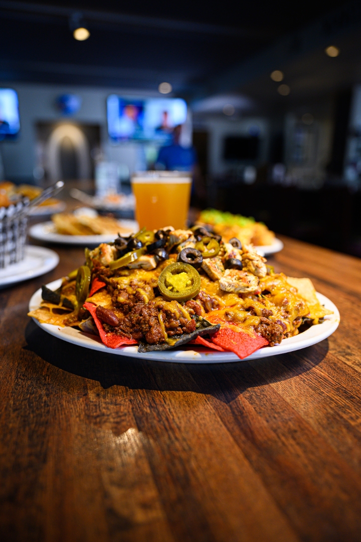Order Macho Nachos food online from Quincy's South Bar & Grille store, Rockville on bringmethat.com