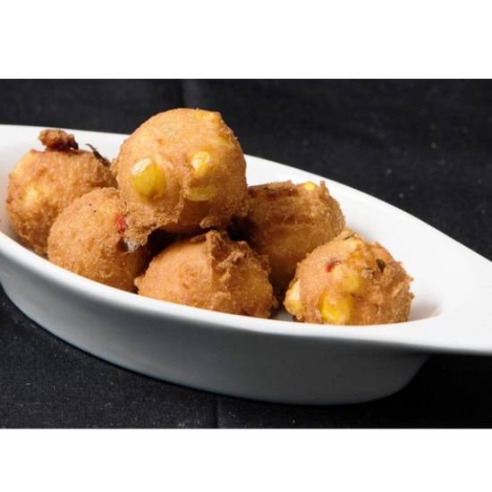 Order Kids Fried Corn Fritters food online from Copeland's of New Orleans - Slidell store, Slidell on bringmethat.com