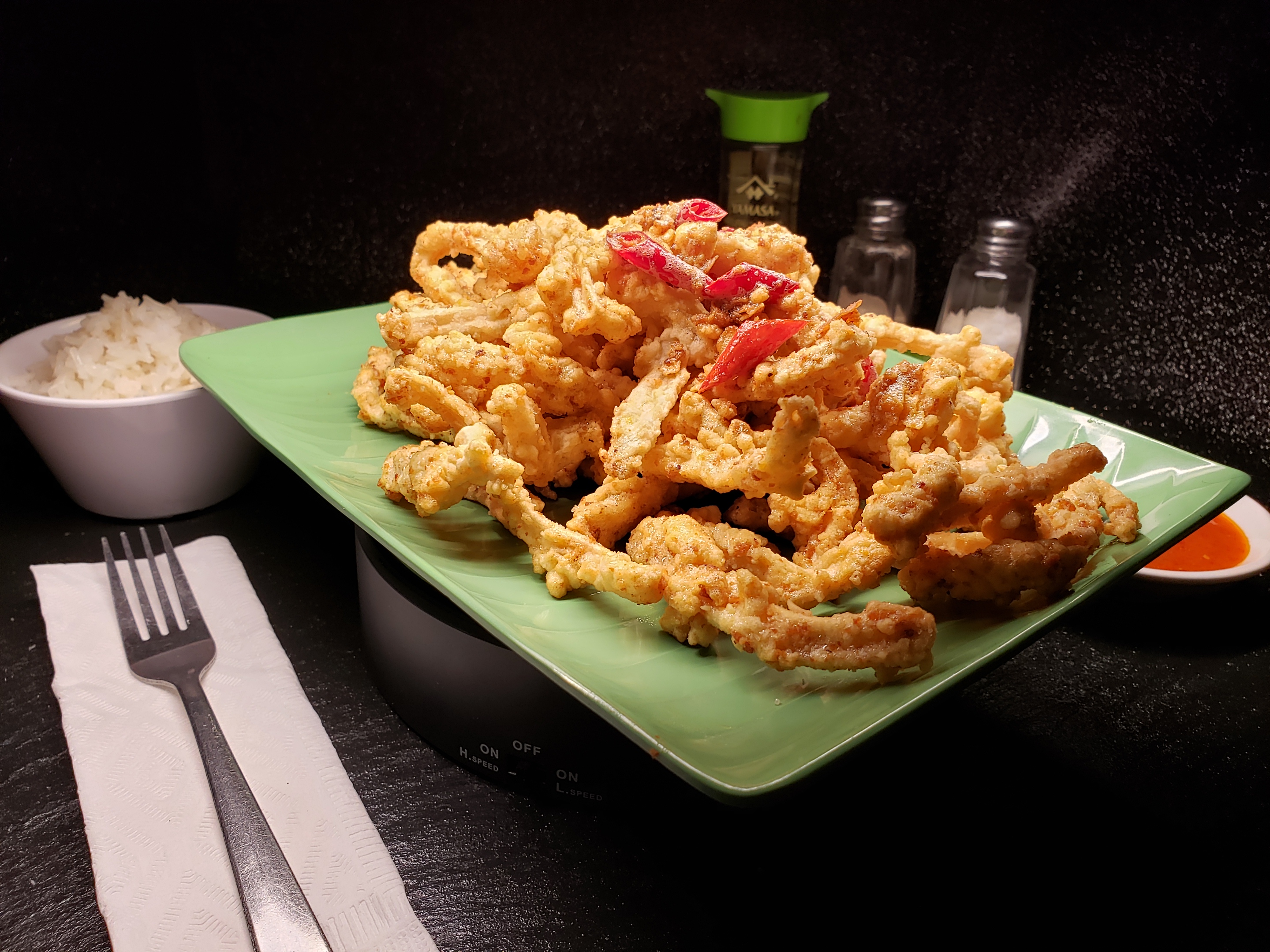 Order S17. Golden Salted Egg Fried Squid food online from Singapore Cafe store, Sugar Land on bringmethat.com