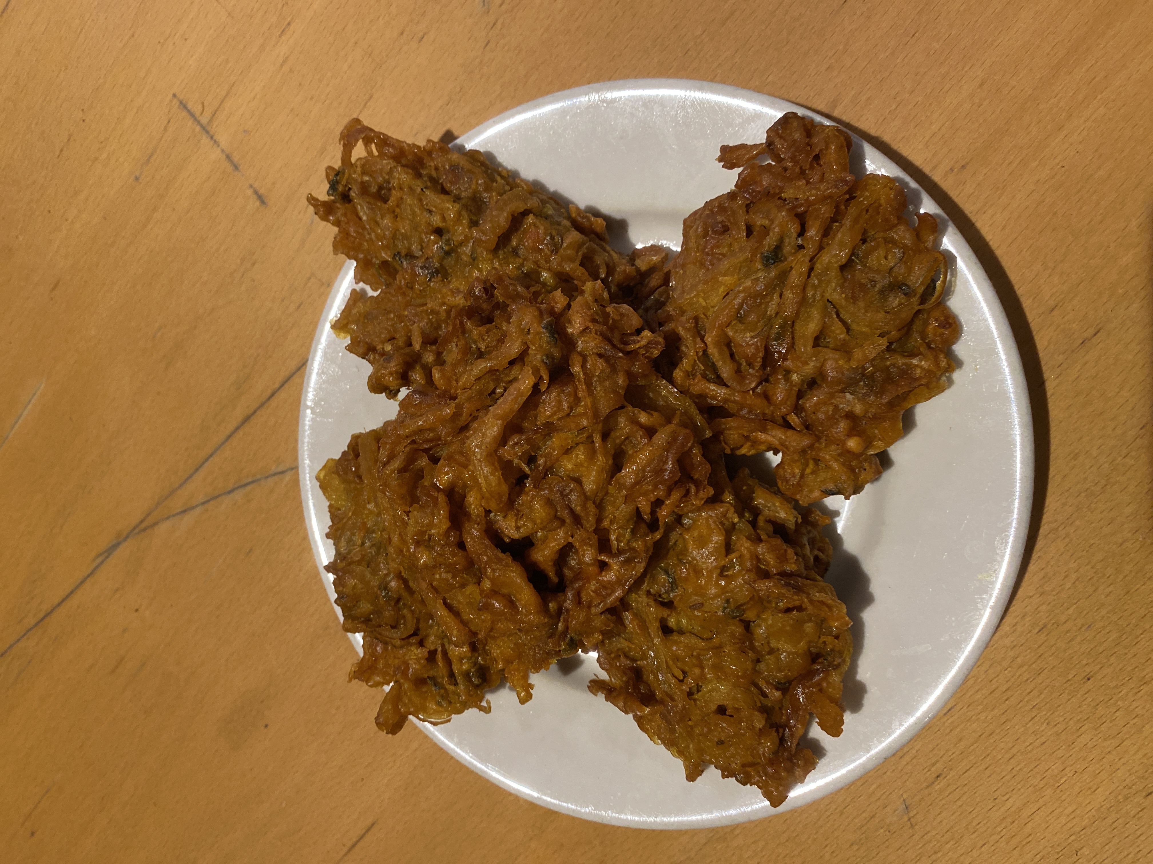 Order Piece Fried Onion ( 5 Pcs ) food online from Bombay Kabab store, Brooklyn on bringmethat.com
