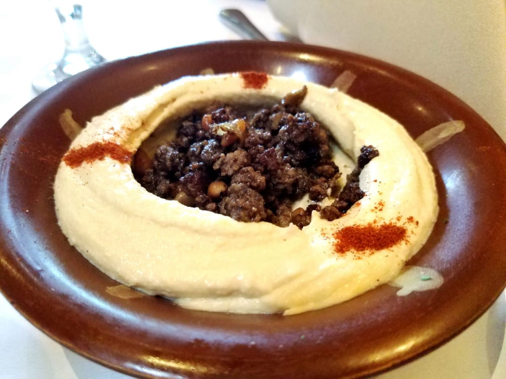 Order Hummus with Meat food online from Arabian Nights store, San Francisco on bringmethat.com