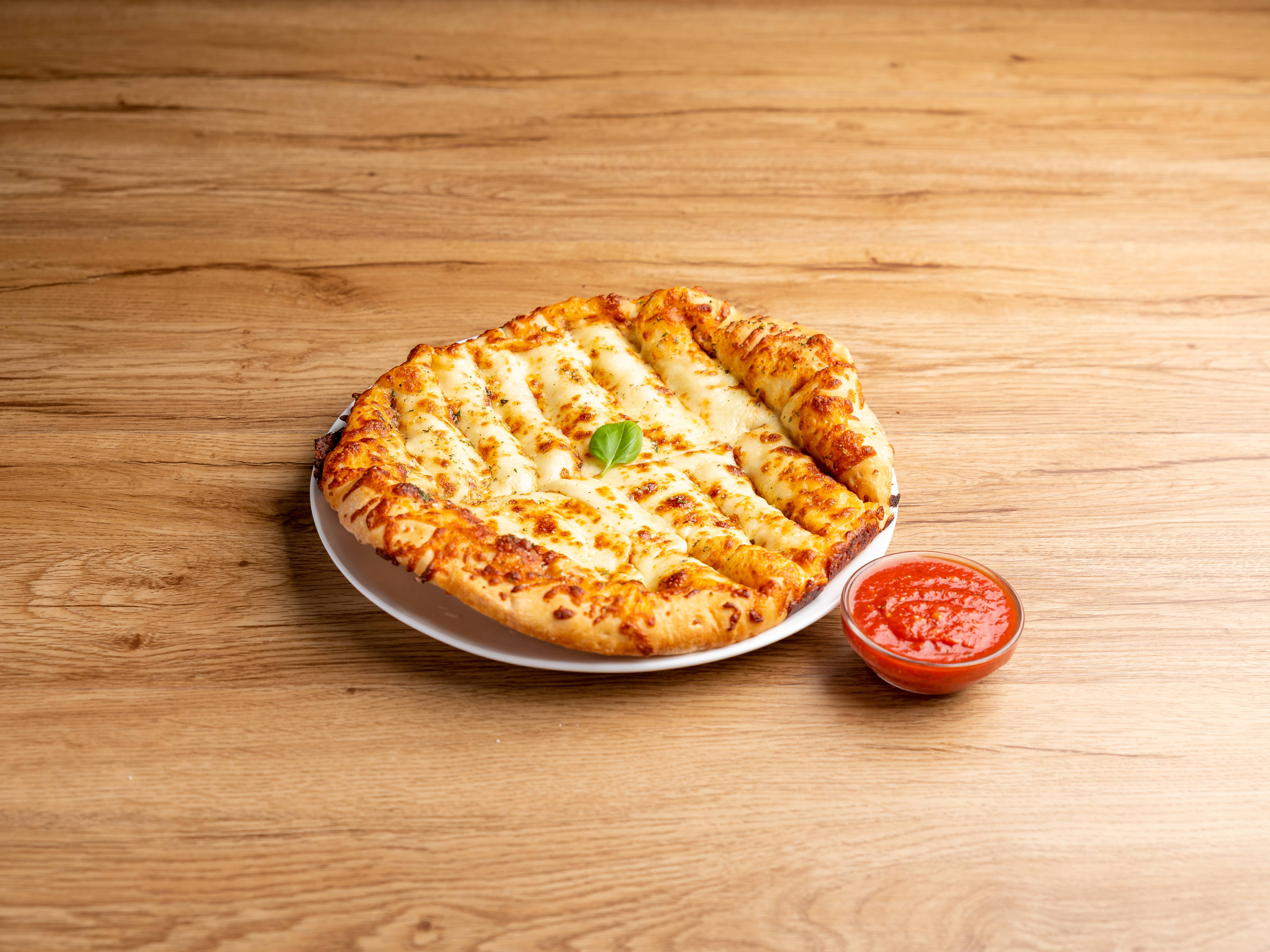 Order 8 Cheesy Breadsticks food online from Pizza Palazzo store, Pittsburgh on bringmethat.com