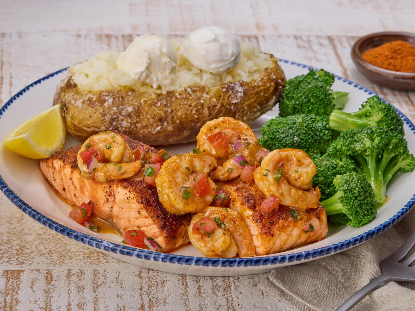 Order Today's Catch - Salmon New Orleans** (full) food online from Red Lobster store, Houston on bringmethat.com