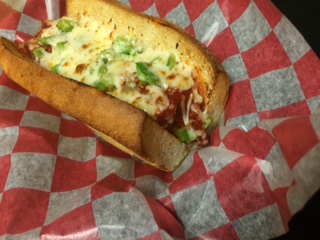 Order Sausage and Green Pepper Parmigiana Sub food online from The Garlic Knot store, Denver on bringmethat.com