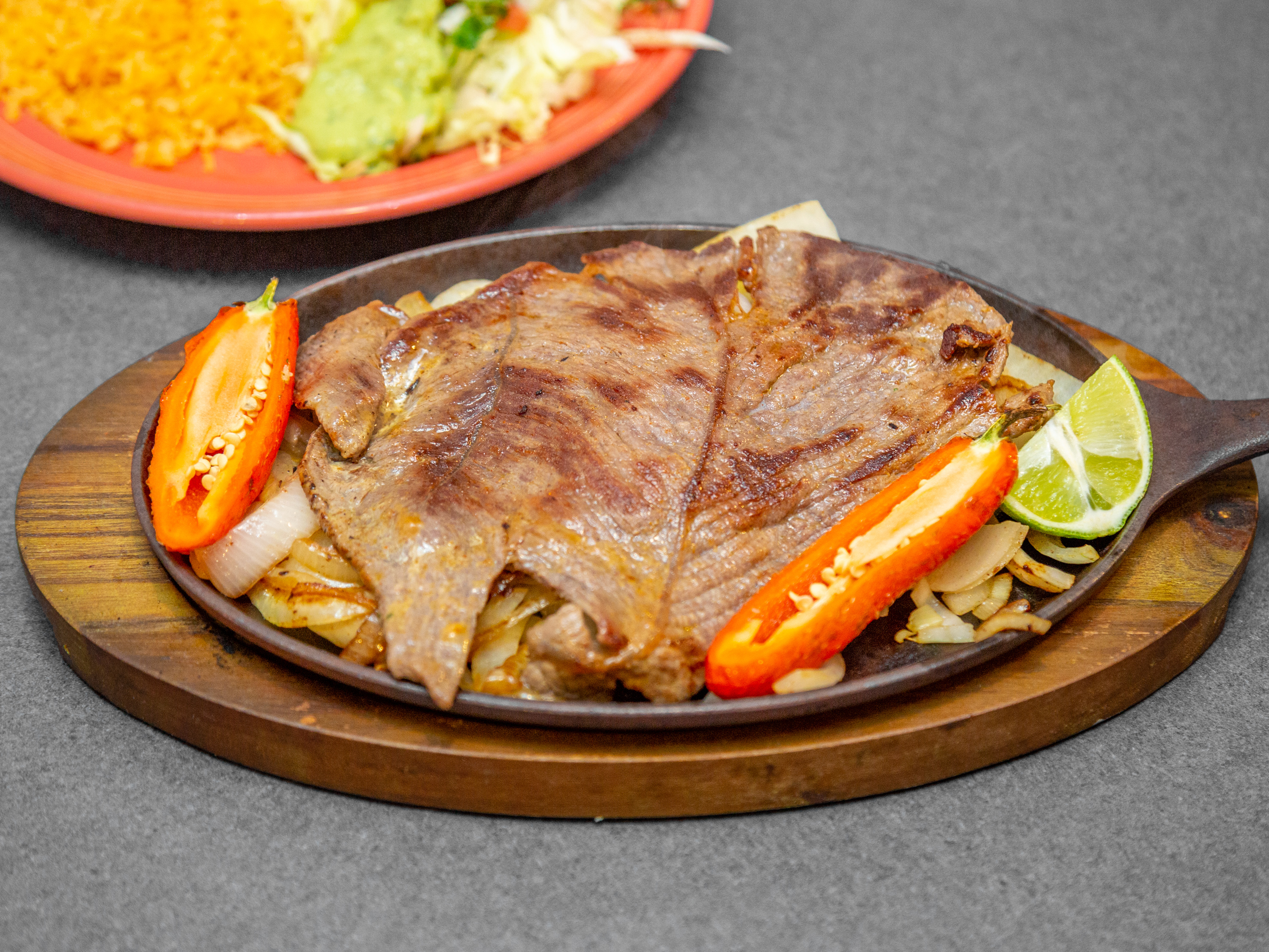 Order Carne Asada food online from La Familia Mexican Restaurant store, Rossville on bringmethat.com