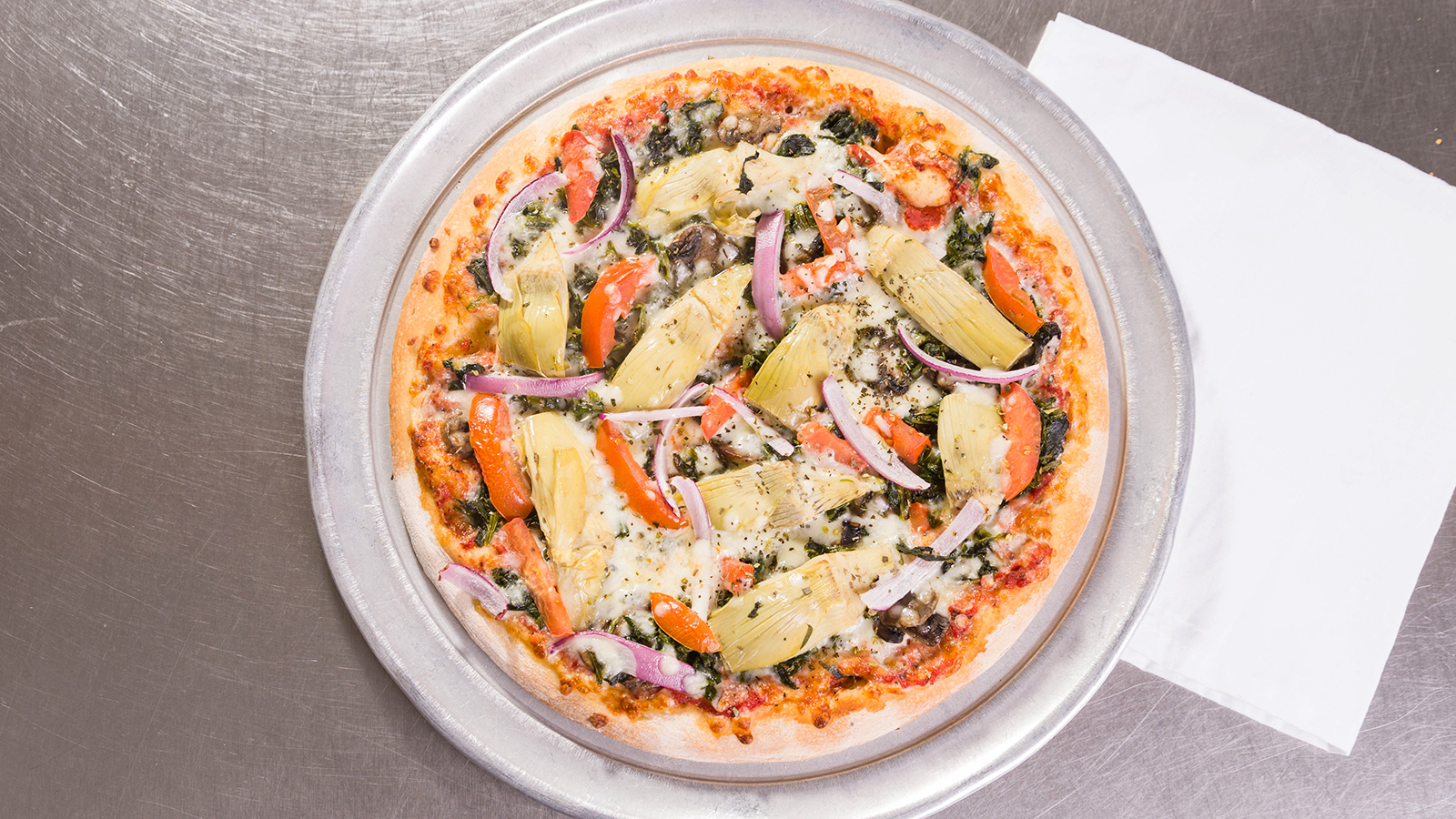 Order Vegetarian Deluxe Pizza food online from Romes Pizza store, Helotes on bringmethat.com