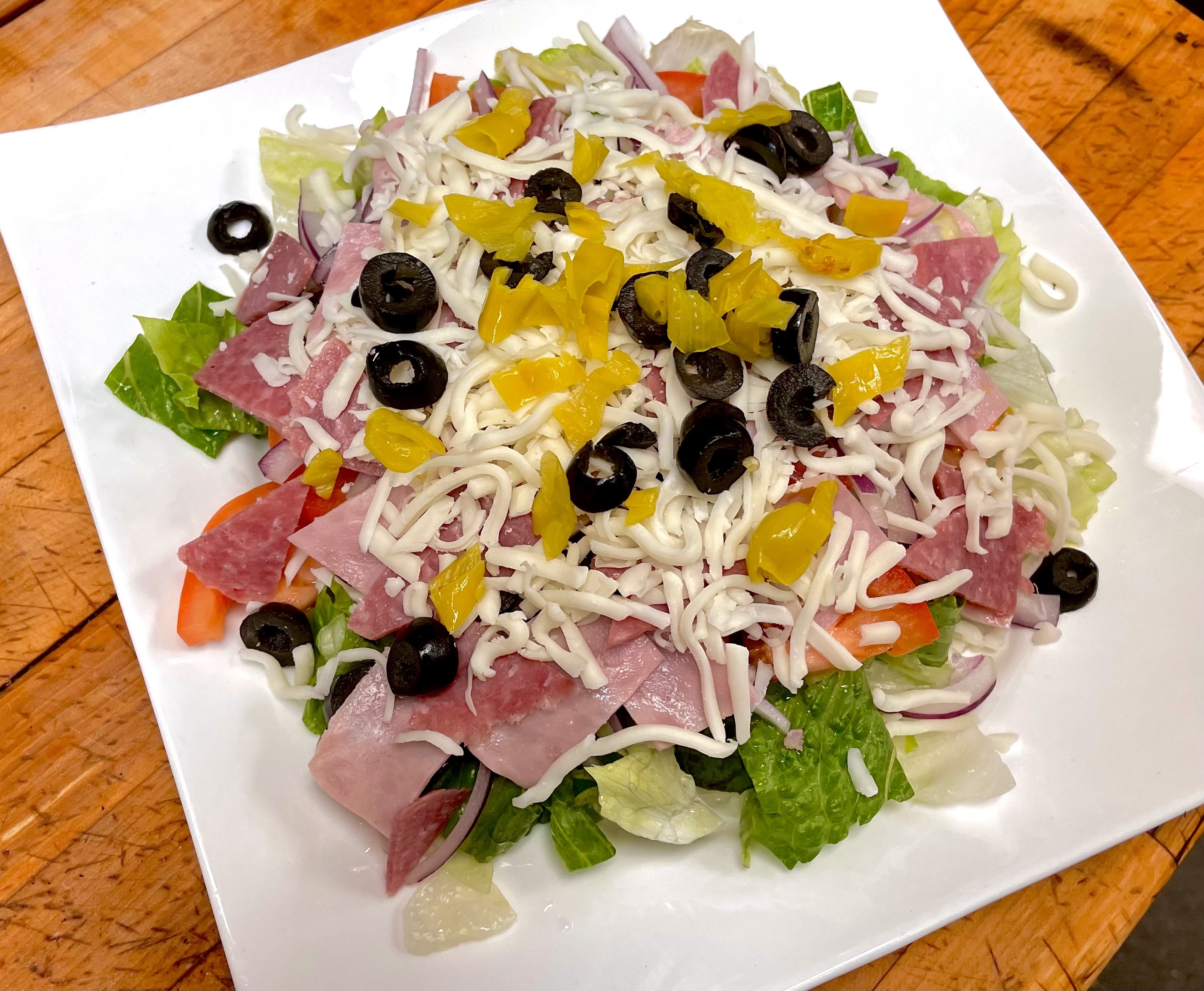 Order Antipasto Salad food online from Augustino Italian Restaurant store, Garden Grove on bringmethat.com