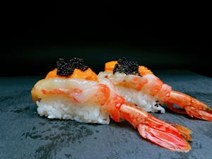 Order C19. Sweet Shrimp with Uni Nigiri food online from Bengee Sushi store, Ontario on bringmethat.com