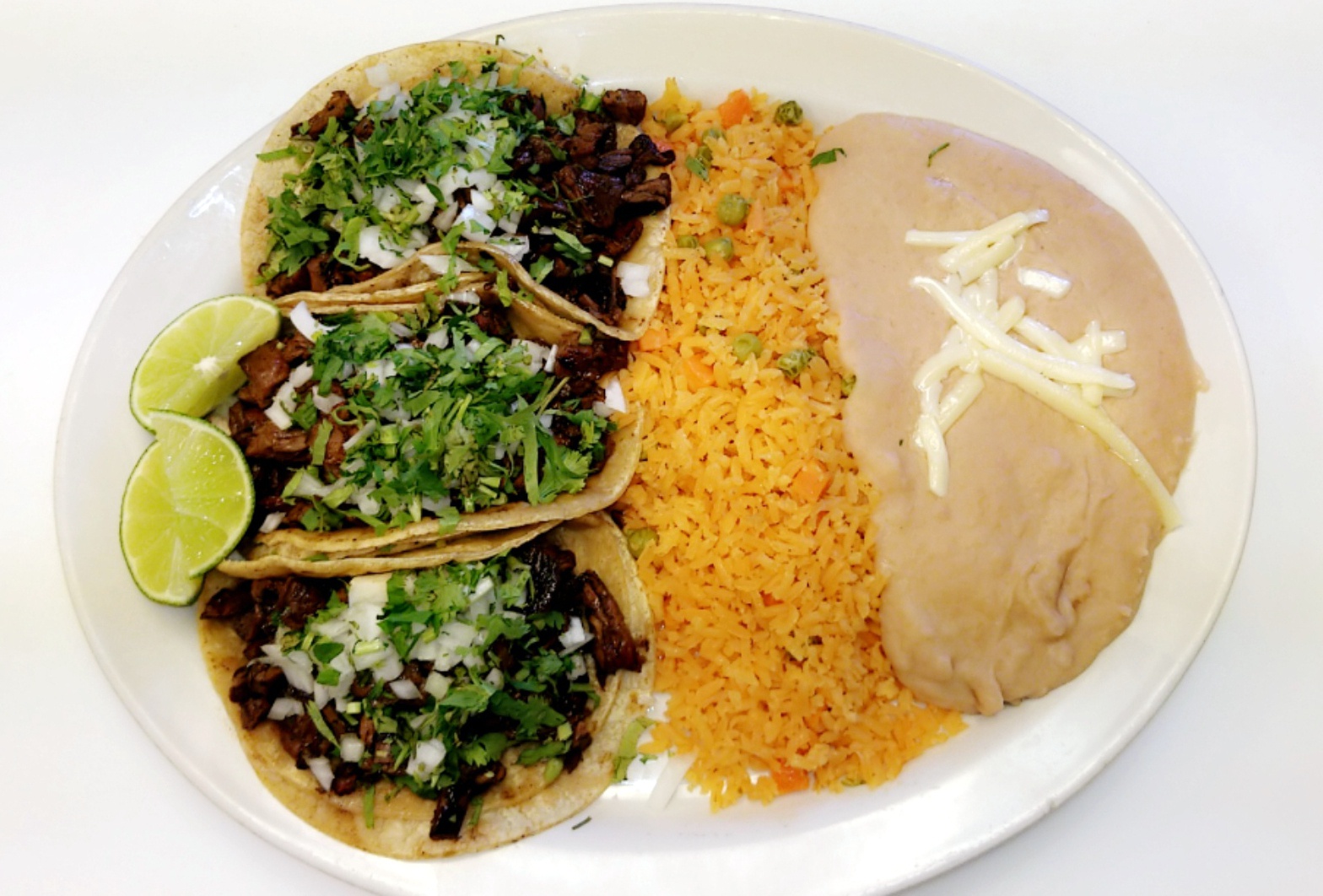Order 2 Taco Dinner food online from Ixcateco Grill store, Chicago on bringmethat.com