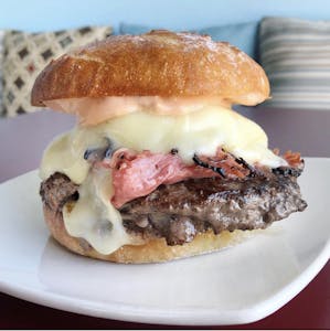 Order Wagyu Pastrami Burger food online from Truffles N Bacon Cafe store, Las Vegas on bringmethat.com