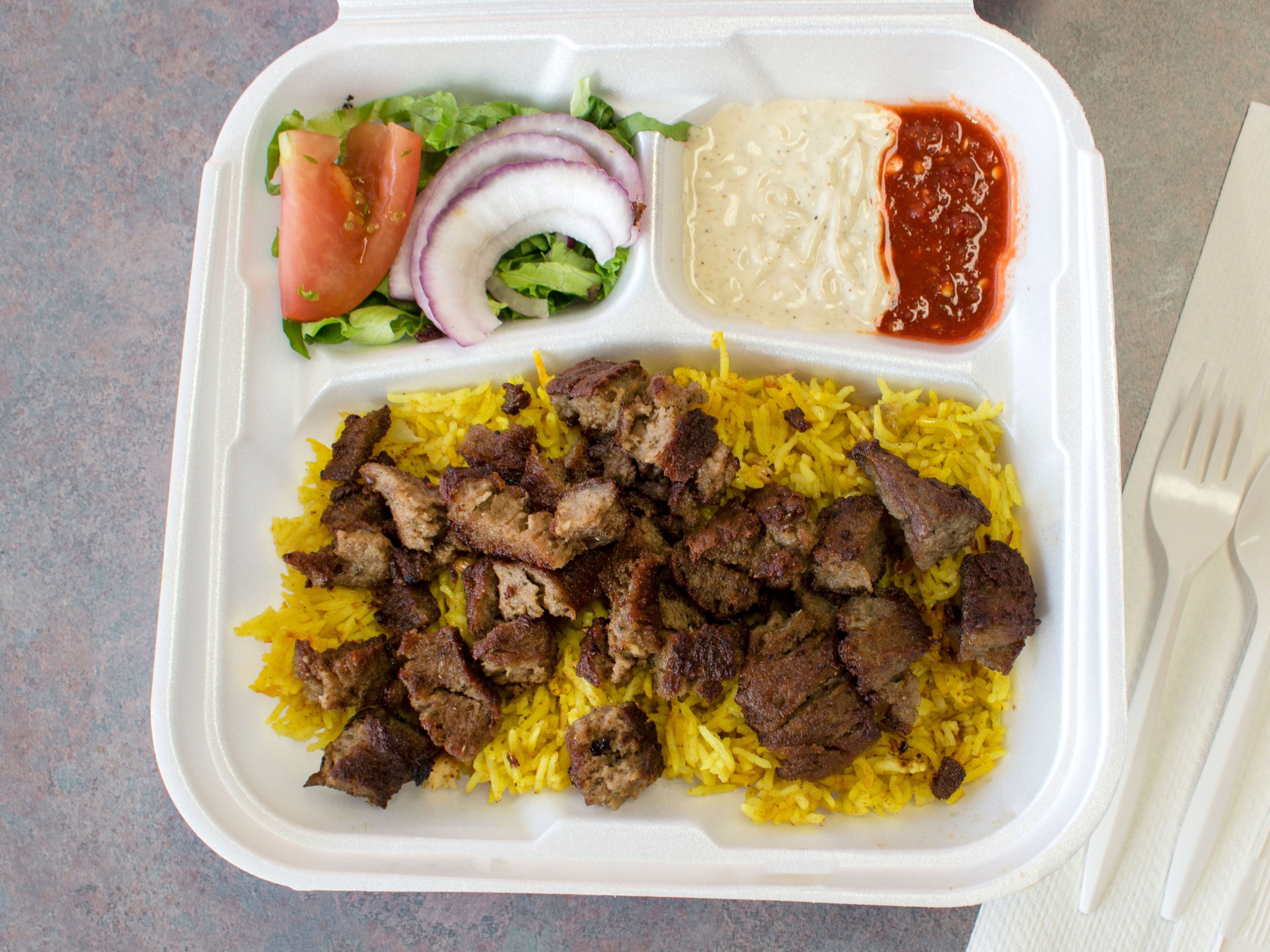 Order Lamb Chops Over Rice food online from Gourmet Hots store, Rochester on bringmethat.com