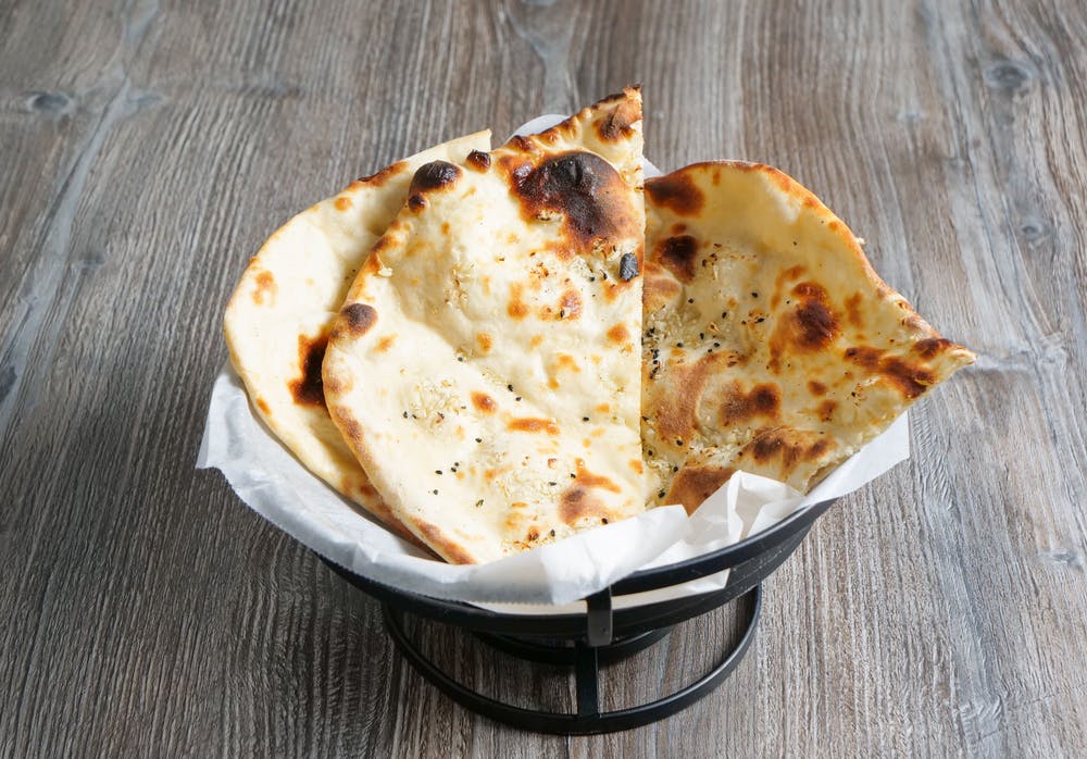 Order Naan food online from Best Desi Pizza store, Campbell on bringmethat.com