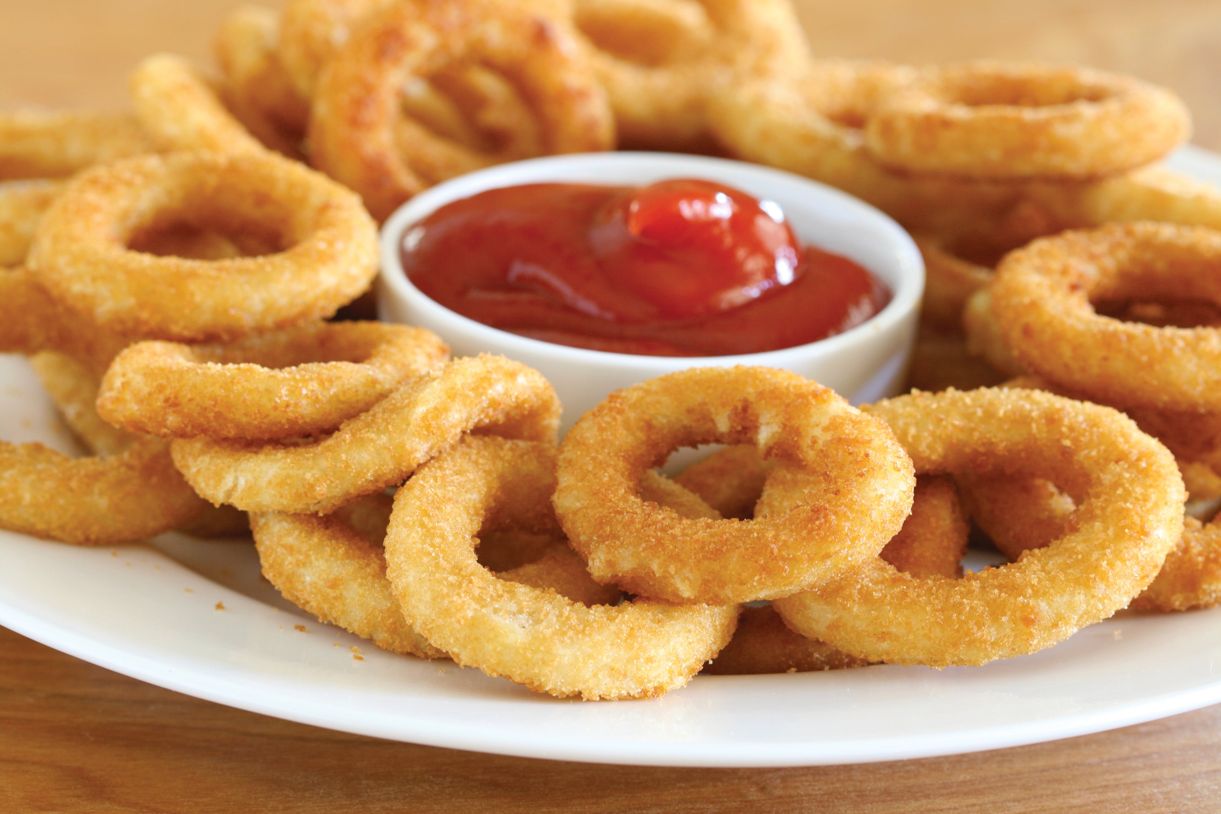Order Onion Rings - Appetizer food online from Tomatoes store, Carnegie on bringmethat.com