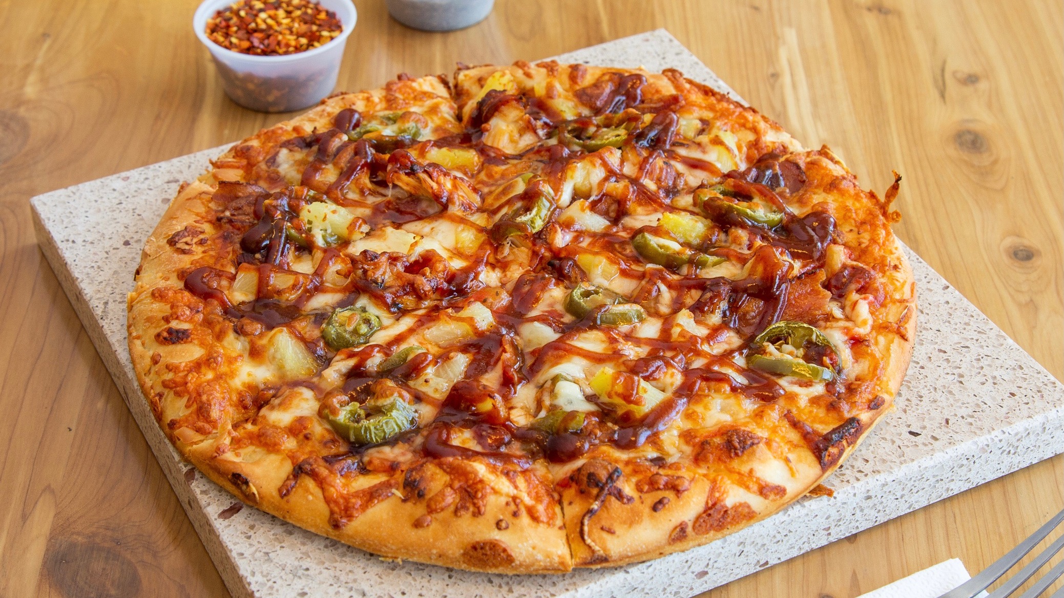 Order Spicy BBQ Chicken food online from 4 Corners Pizza store, Newton Highlands on bringmethat.com