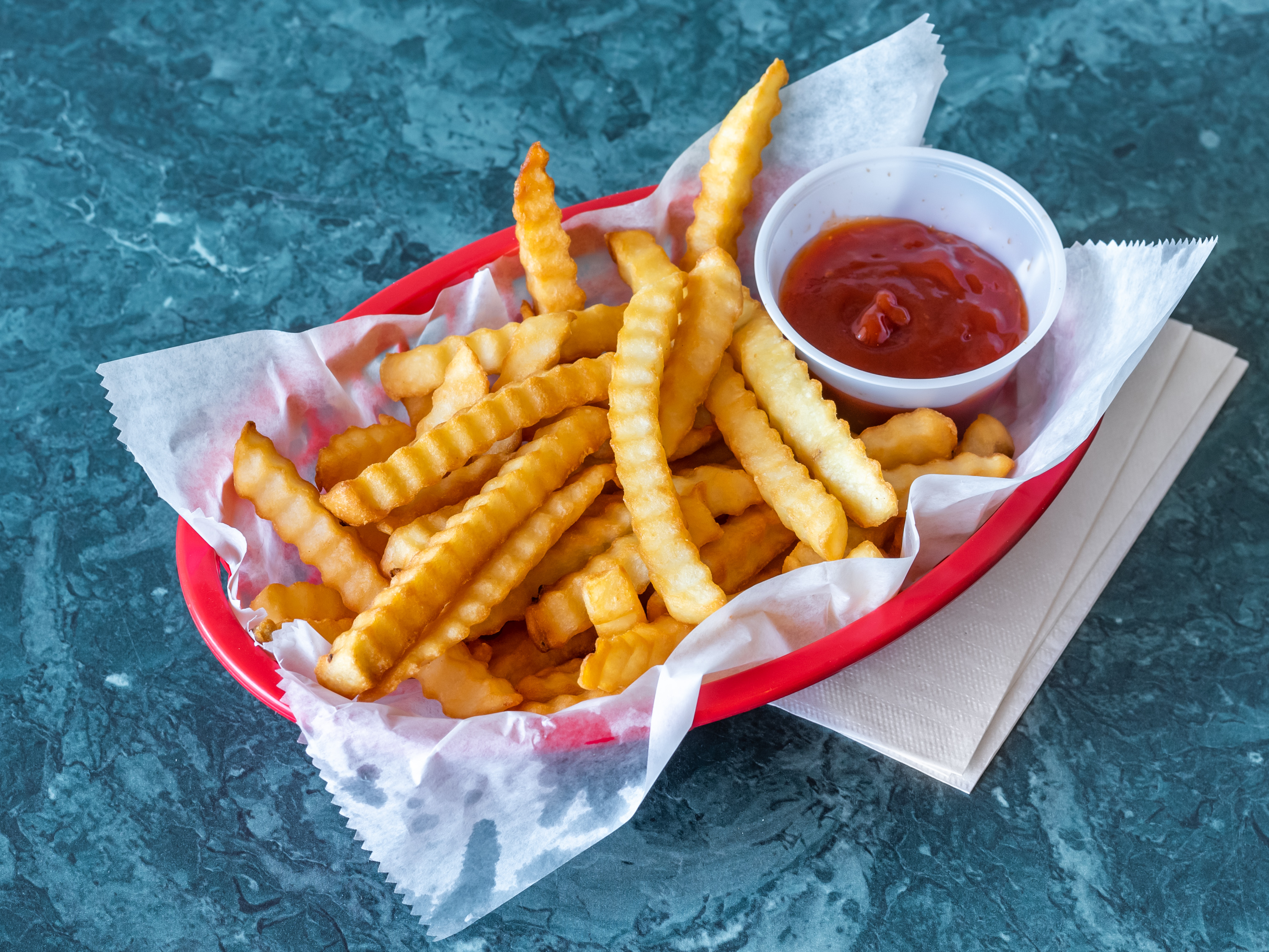 Order French Fries food online from Guidos Pizza store, Eatontown on bringmethat.com