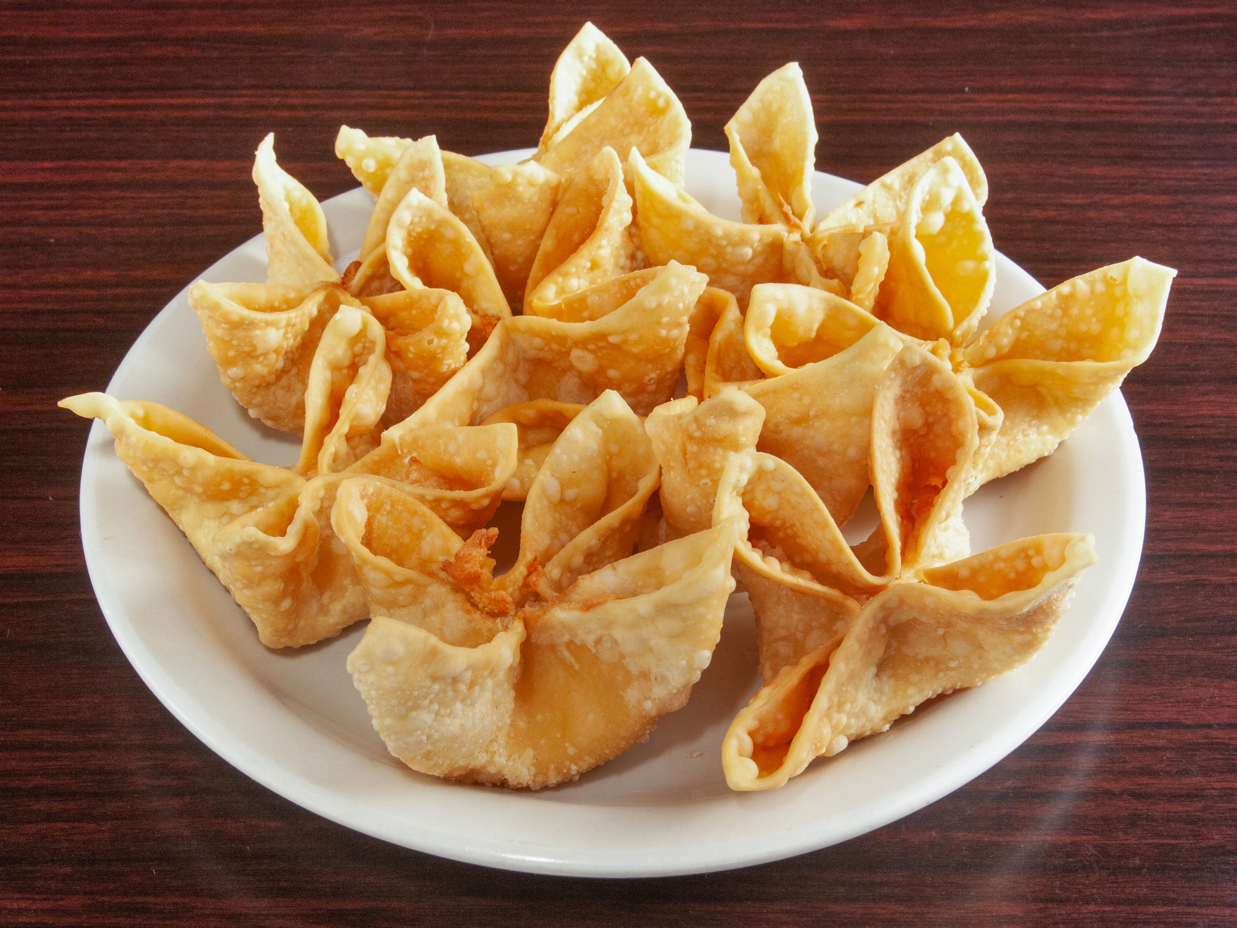 Order 6 Piece Crab Rangoon food online from China Buffet Mongolian Grill store, Omaha on bringmethat.com