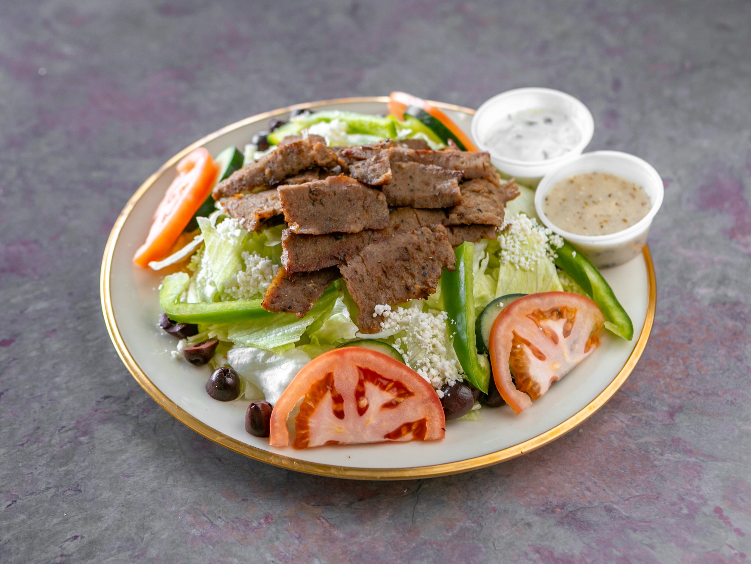 Order Gyro Salad food online from Never On Sunday store, Kansas City on bringmethat.com
