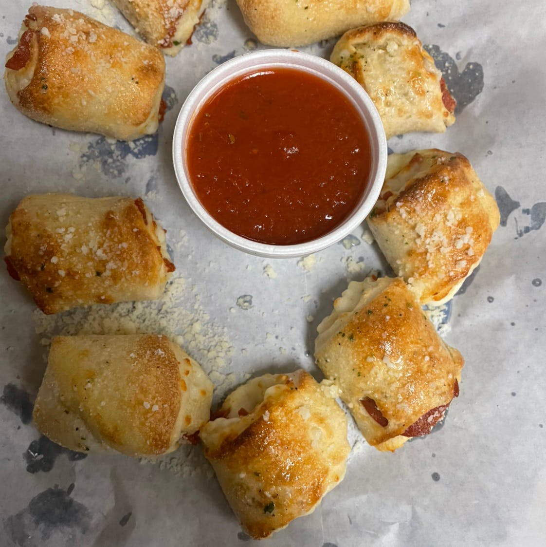 Order Pepperoni & Cheese Garlic Knots - Appetizer food online from Casa Nostra Italian Cuisine store, Greeneville on bringmethat.com