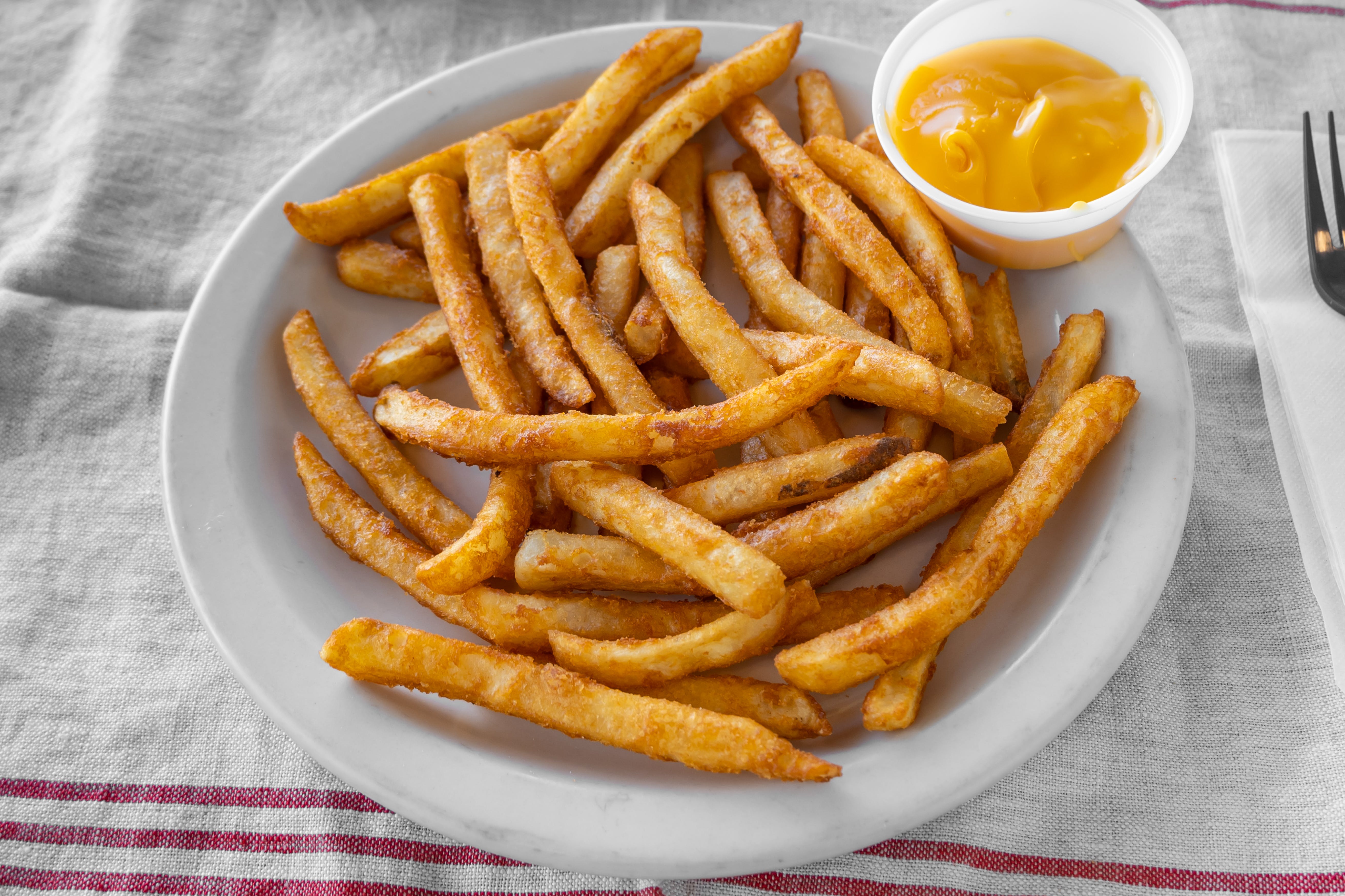 Order Cheese Fries - Small food online from Divincenzo Pizza store, Cinnaminson on bringmethat.com