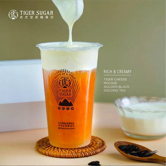 Order Golden Oolong Tea +CHEESE FOAM food online from Tiger Sugar store, Kennesaw on bringmethat.com